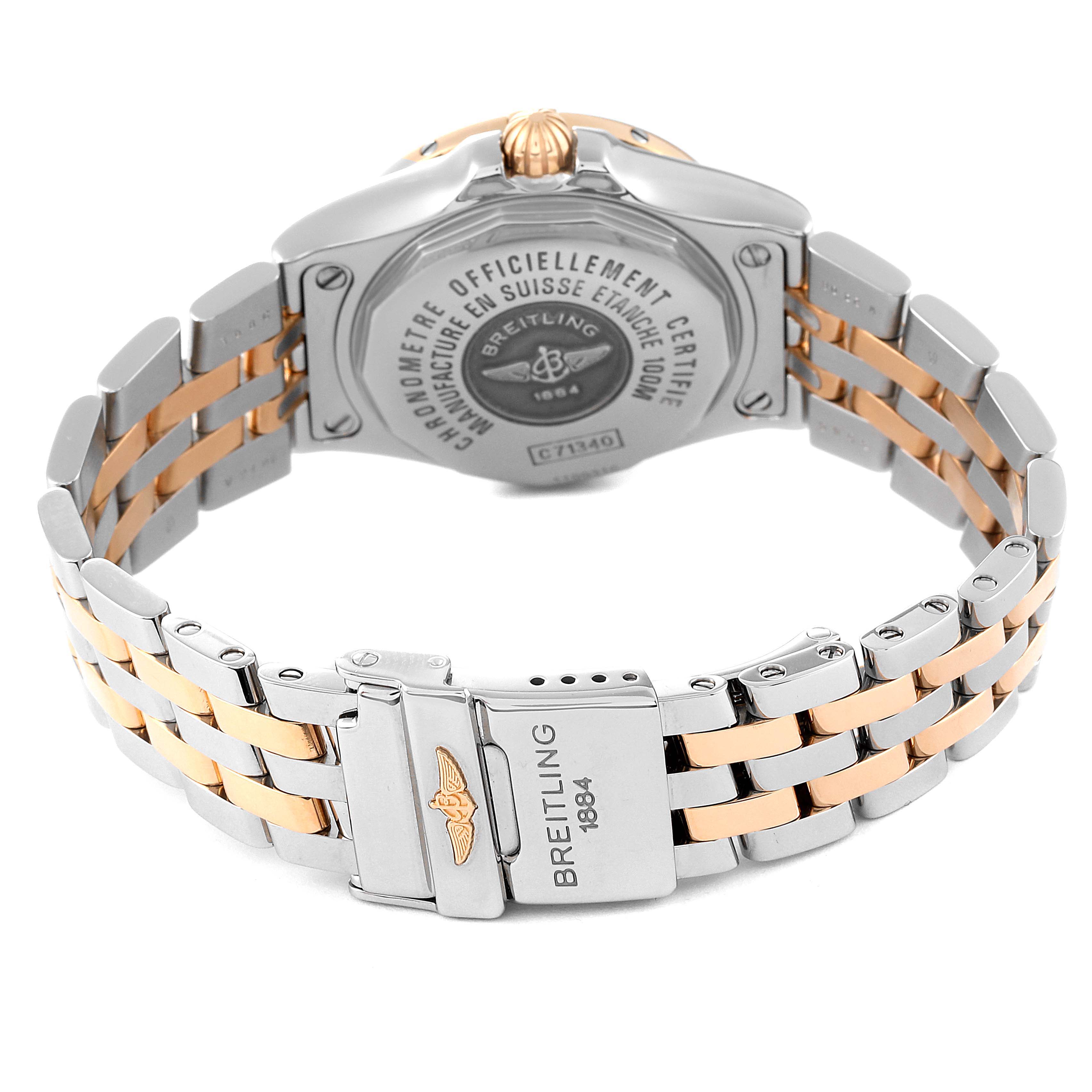 The image shows the back view of a Breitling C71340 Women's Steel and Gold (two tone) Black Dial C71340 Women's Steel and Gold (two tone) Black Dial Galactic 30 Steel Rose Gold Diamond Womens Watch C71340, highlighting its bracelet and clasp.