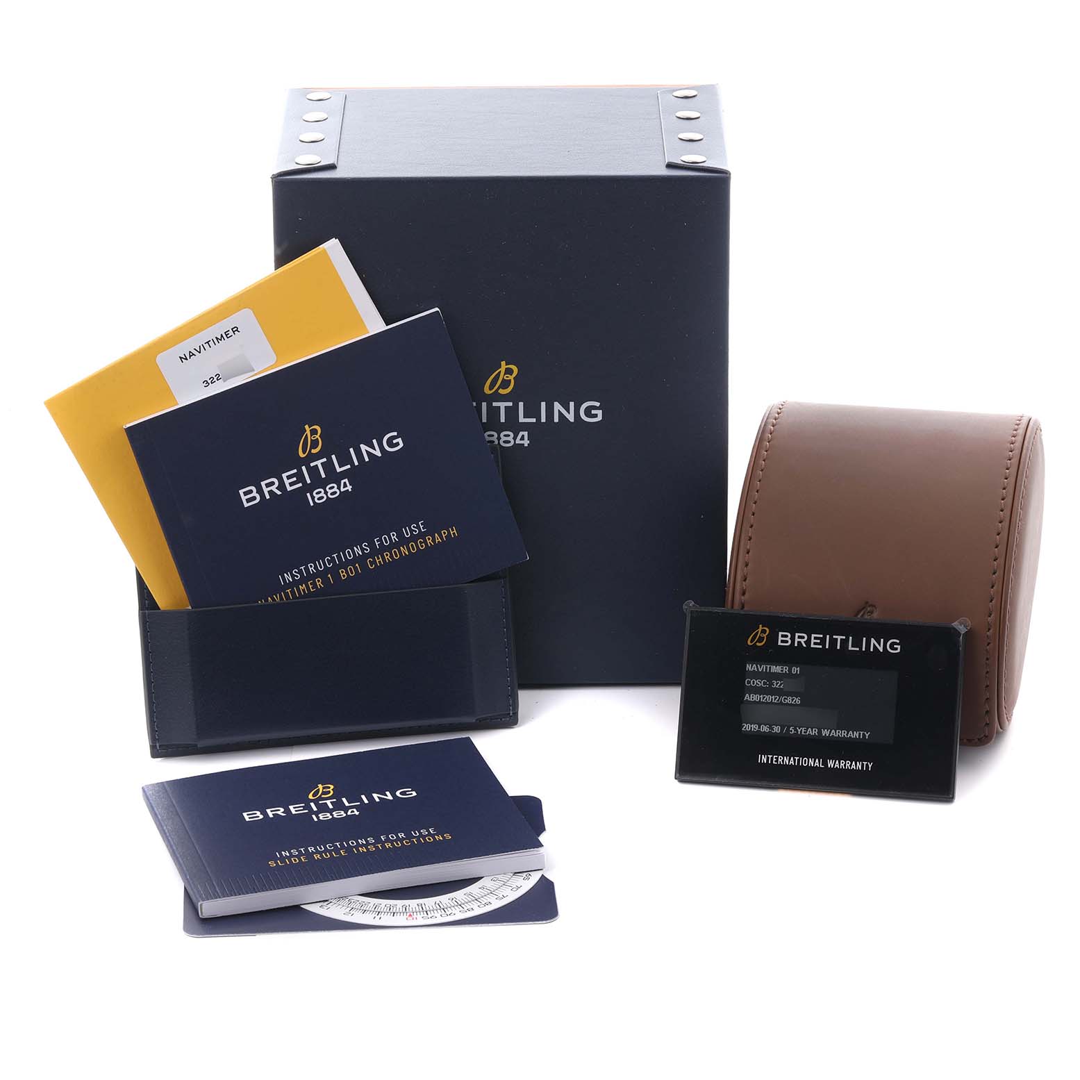 The image shows a Breitling Navitimer AB012012/G826 Men's Stainless Steel Silver Dial AB012012/G826 Men's Stainless Steel Silver Dial watch box, manuals, warranty, and a leather case, viewed from a front angle.
