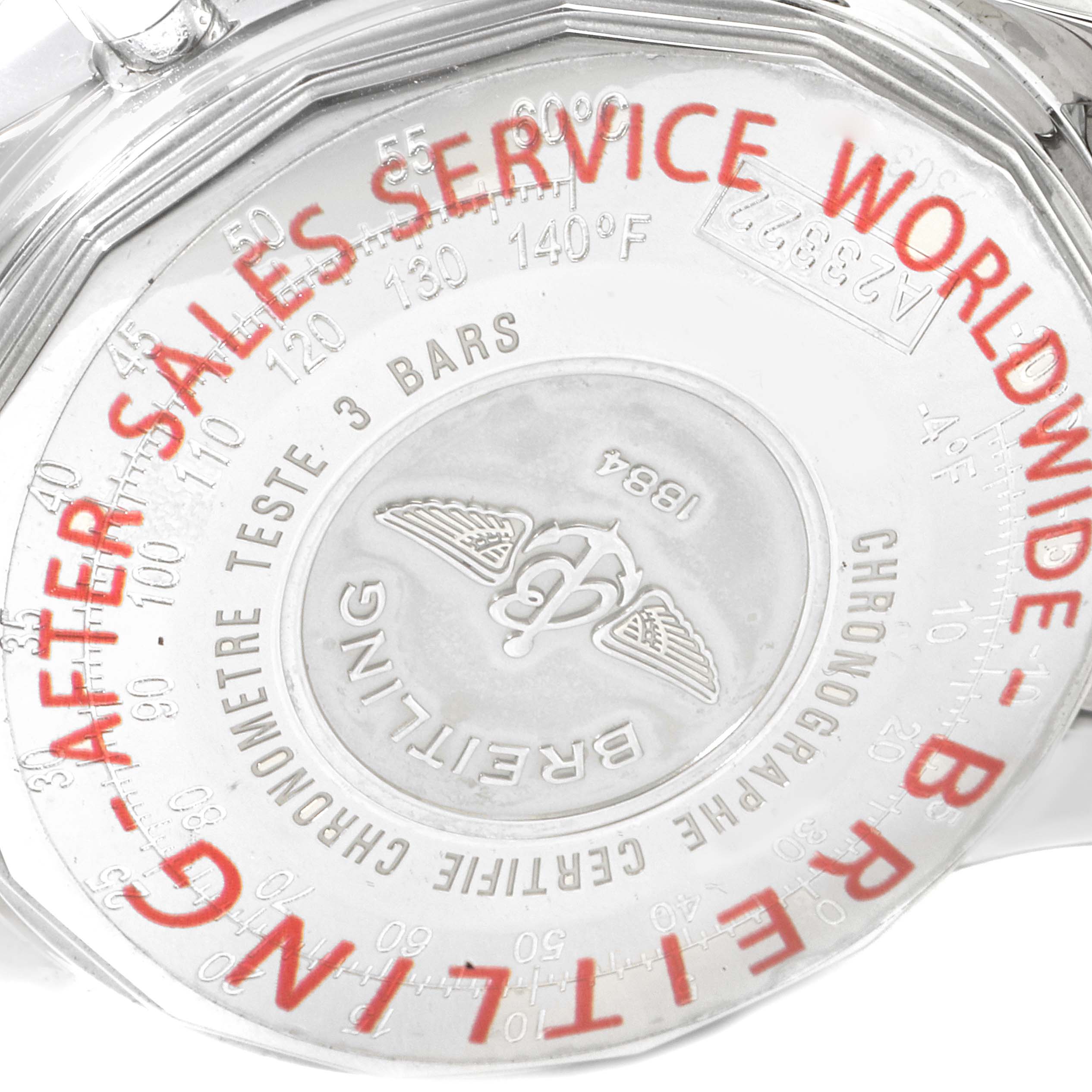 This image shows the case back of a Breitling Navitimer A23322 Men's Stainless Steel Silver Dial A23322 Men's Stainless Steel Silver Dial watch, highlighting the branding and after-sales service details.