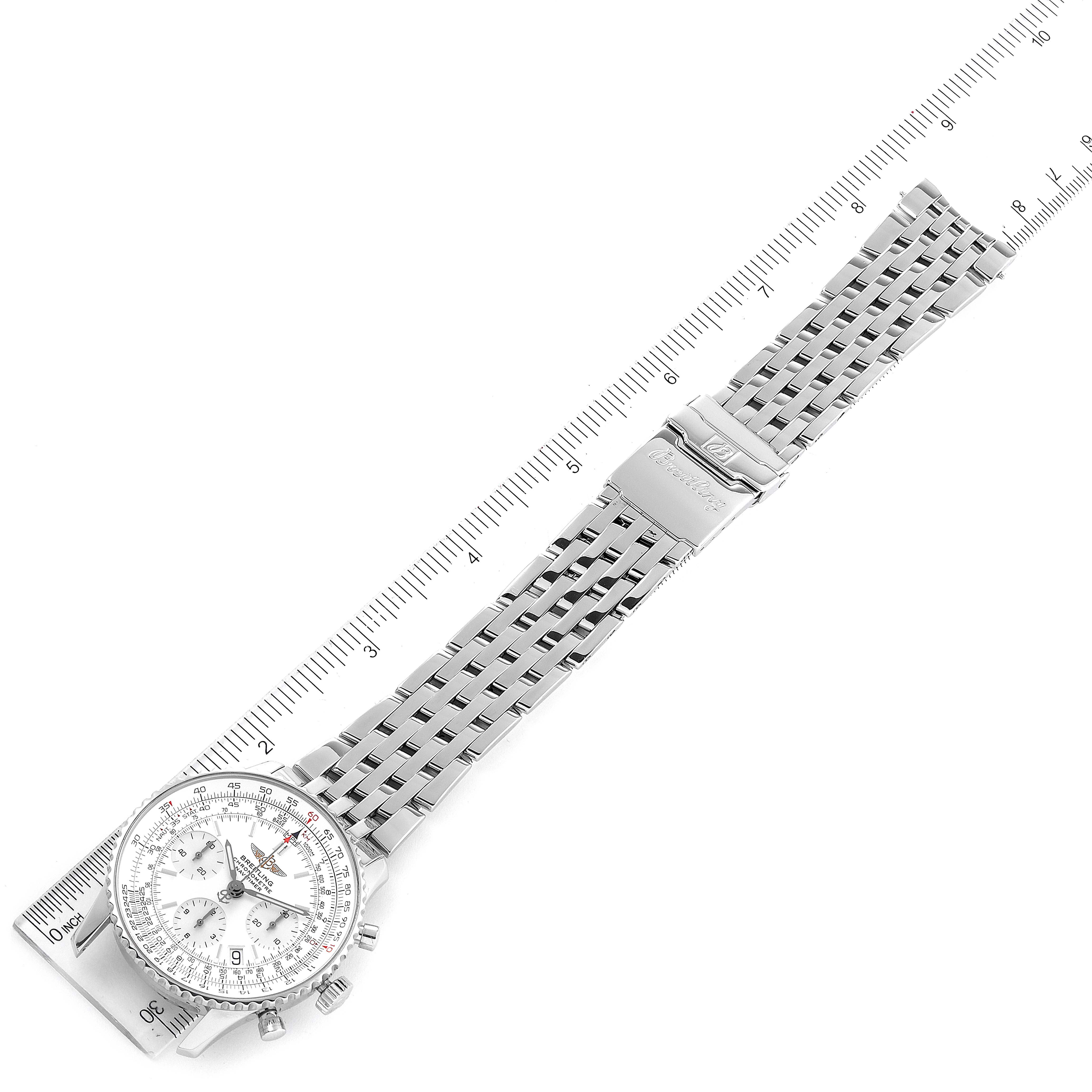 The Breitling Navitimer A23322 Men's Stainless Steel Silver Dial A23322 Men's Stainless Steel Silver Dial watch is shown from a top-down angle, displaying the full bracelet and dial with an adjacent measuring ruler.