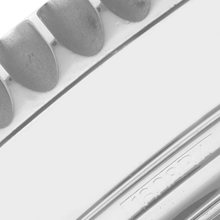 This close-up image shows the bezel's edge and part of the case of the Breitling Navitimer A21330 Men's Stainless Steel Silver Dial A21330 Men's Stainless Steel Silver Dial watch.