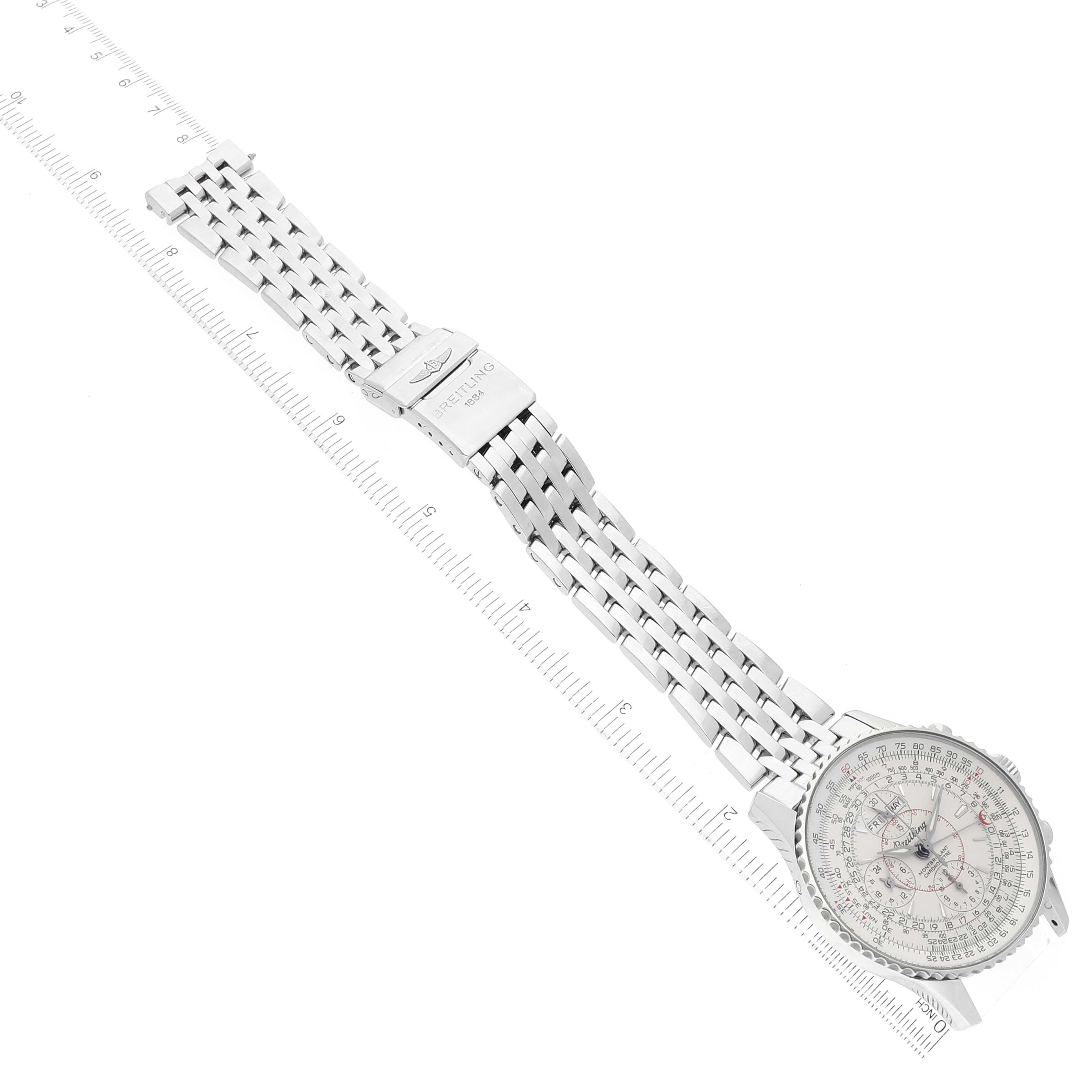 The image shows a Breitling Navitimer A21330 Men's Stainless Steel Silver Dial A21330 Men's Stainless Steel Silver Dial watch laid out flat, featuring its stainless steel case, intricate dial, and metal bracelet.