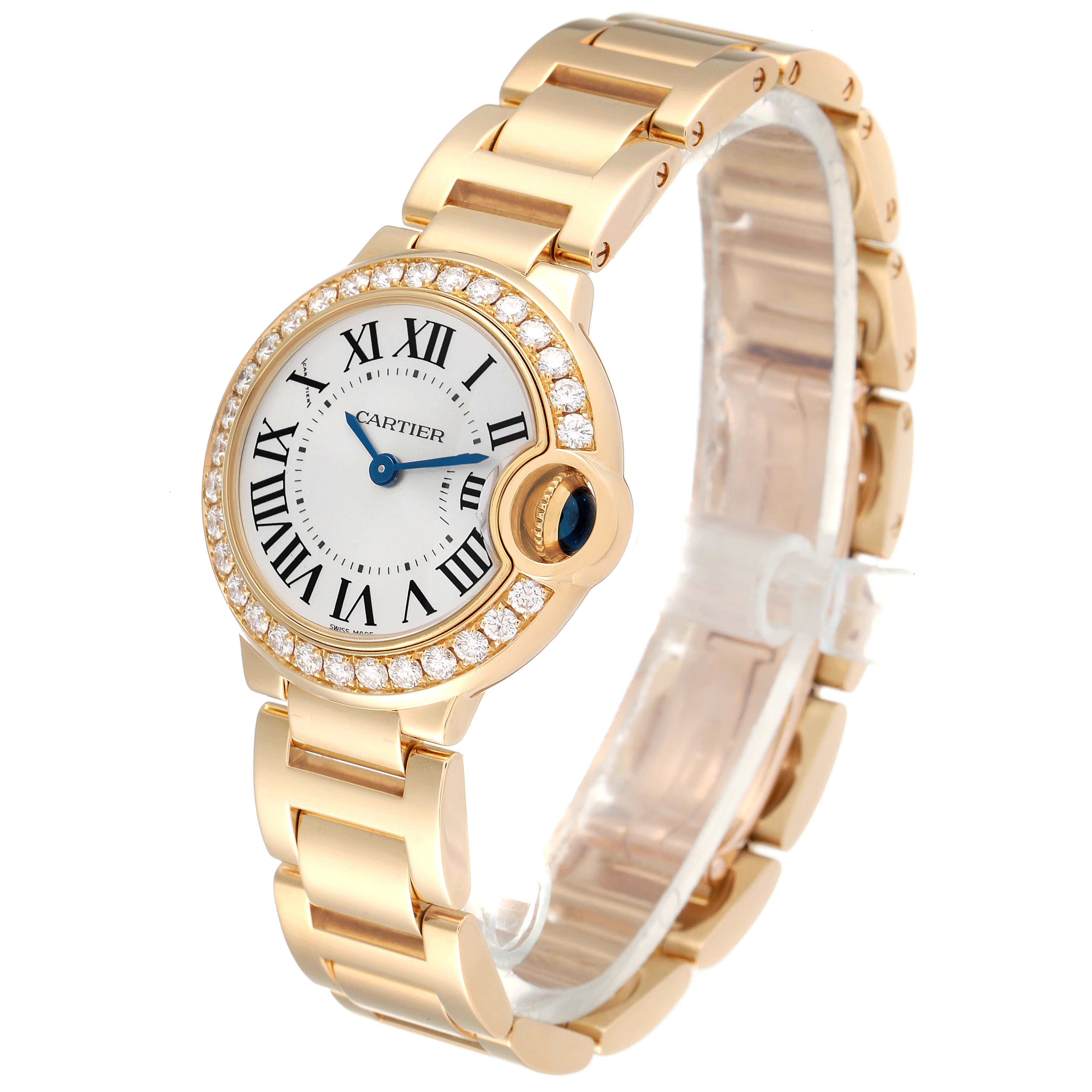 The image shows a Cartier Ballon Bleu WE9001Z3 Women's Yellow Gold Silver Dial WE9001Z3 Women's Yellow Gold Silver Dial watch at a three-quarter angle, highlighting the watch face, bracelet, and detailed bezel.