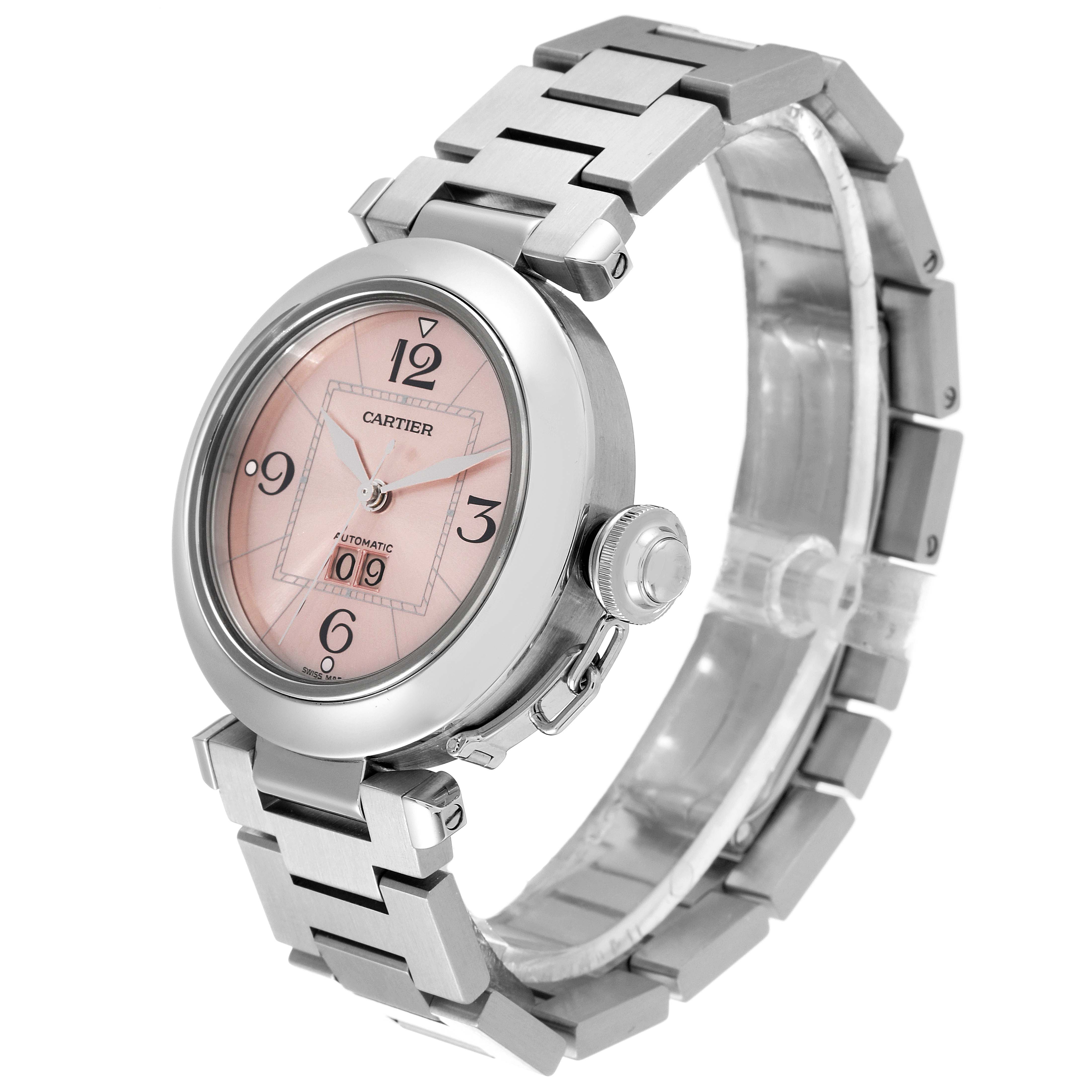 The image shows a Cartier Pasha W31058M7 Women's Stainless Steel Pink Dial W31058M7 Women's Stainless Steel Pink Dial model watch at a three-quarter angle, highlighting its round case, pink dial, and metal bracelet.