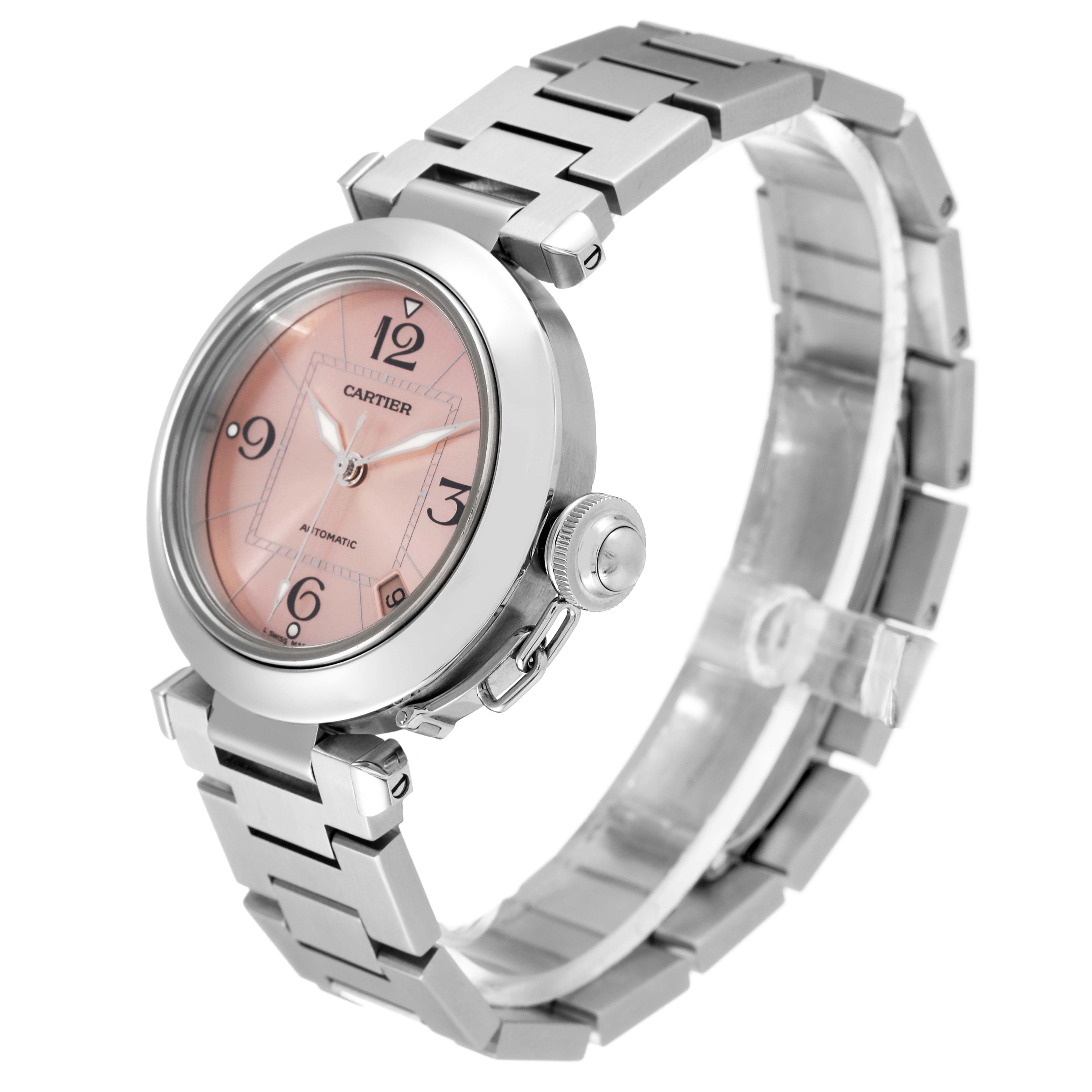 This image shows a Cartier Pasha W31075M7 Women's Stainless Steel Pink Dial W31075M7 Women's Stainless Steel Pink Dial watch from a three-quarter angle, highlighting the face, bezel, crown, and bracelet.