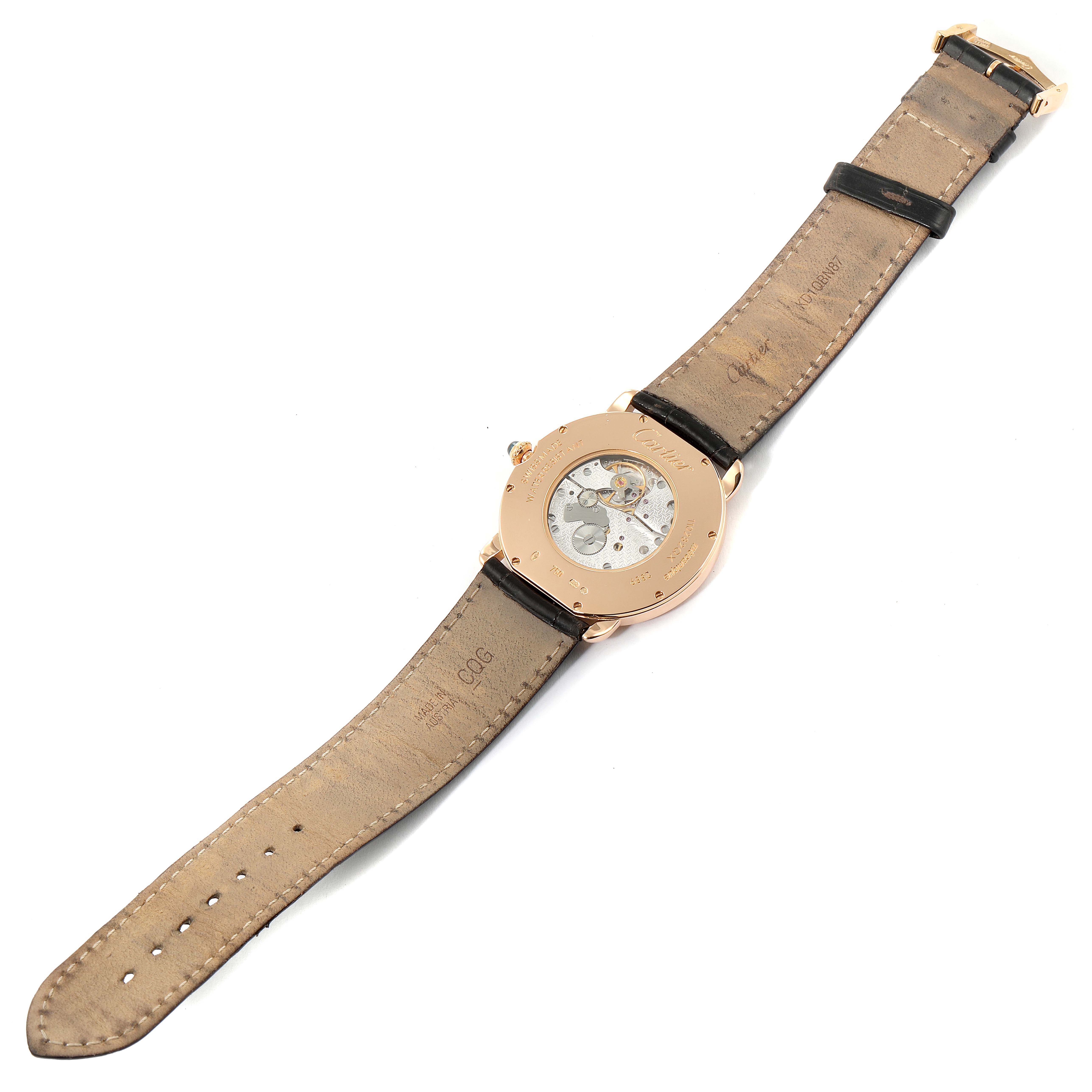 The image shows the back view of a Cartier Ronde W6800251 Men's Rose Gold Silver Dial W6800251 Men's Rose Gold Silver Dial model watch, highlighting the straps and the mechanism through the case back.
