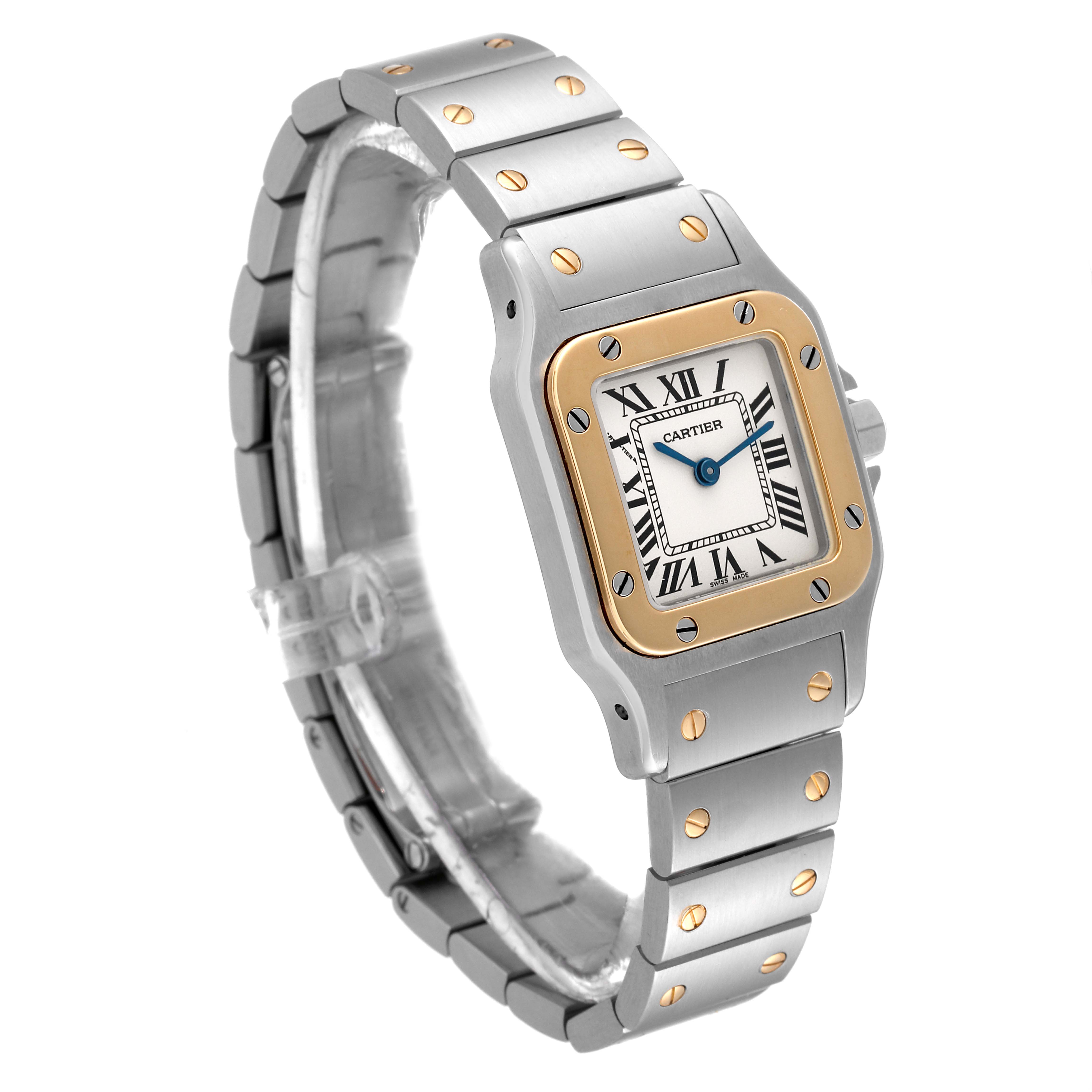 The image shows a Santos model by Cartier from a slight side angle, displaying its bracelet, bezel, and face with Roman numerals.