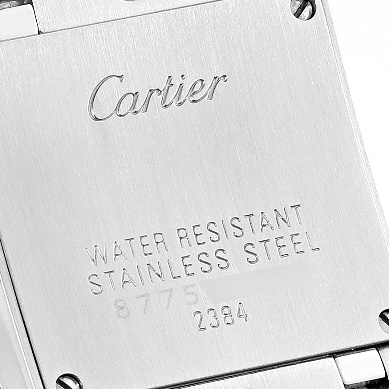 This image shows the back casing of a Cartier Tank Francaise W51034Q3 Women
s Stainless Steel Mother of Pearl Dial W51034Q3 Women
s Stainless Steel Mother of Pearl Dial watch, highlighting its stainless steel and water-resistant features.