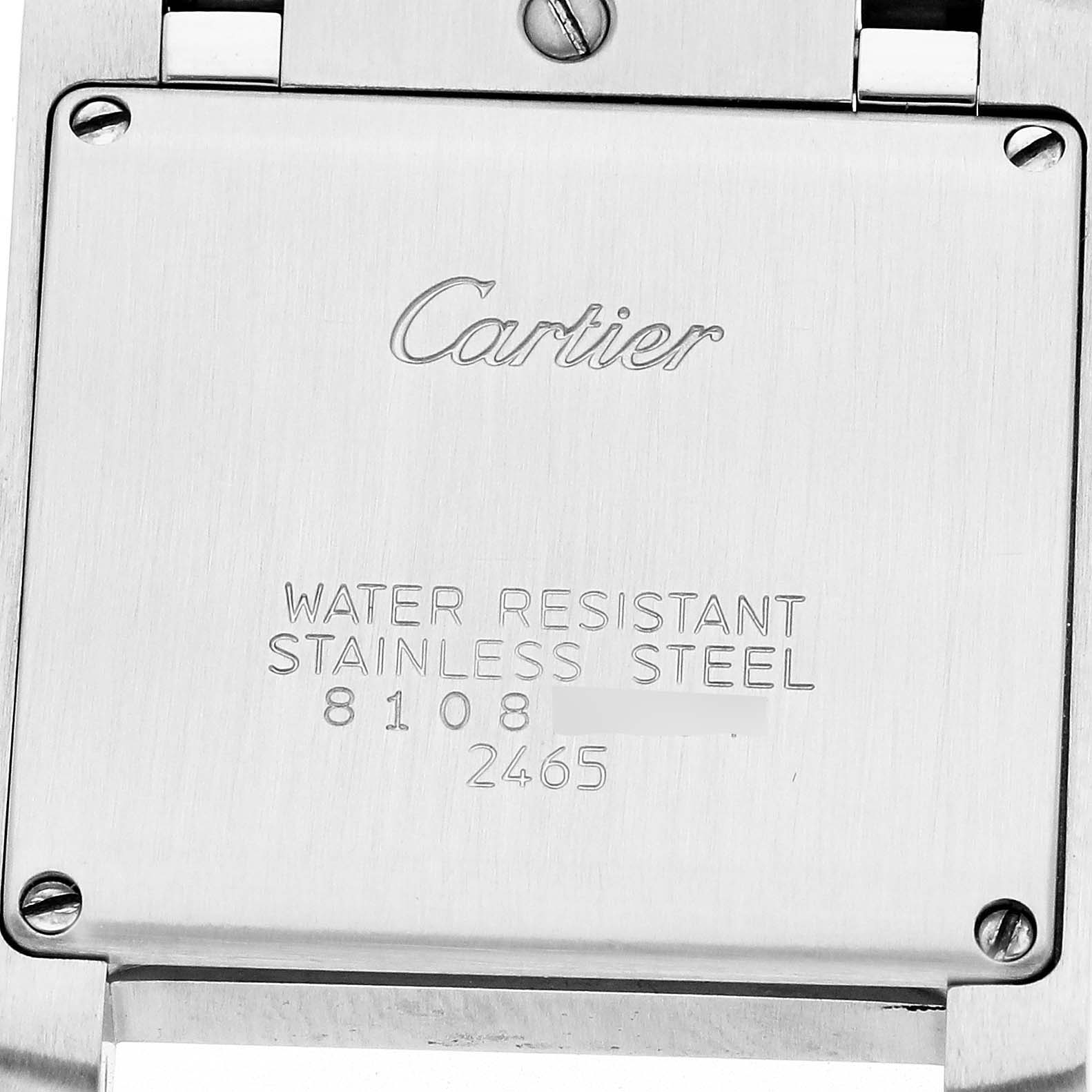 The image shows the back of the Cartier Tank Francaise W51012Q4 Women's Steel and Gold (two tone) Silver Dial W51012Q4 Women's Steel and Gold (two tone) Silver Dial, highlighting the engraving with water resistance details.