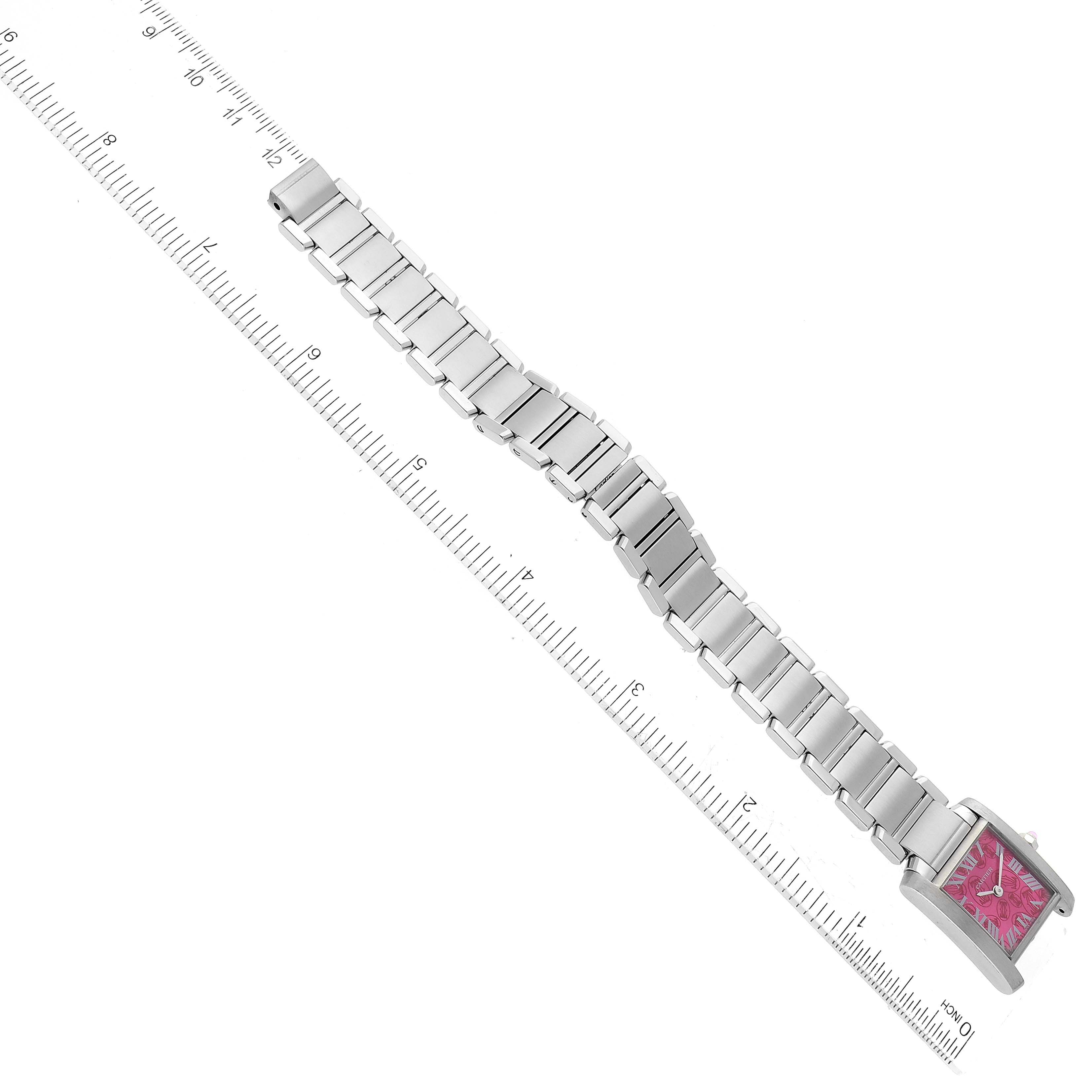 The Cartier Tank Francaise W51030Q3 Women's Stainless Steel Pink Dial W51030Q3 Women's Stainless Steel Pink Dial watch model is shown from a top-down view, displaying its face, band, and a ruler for scale.