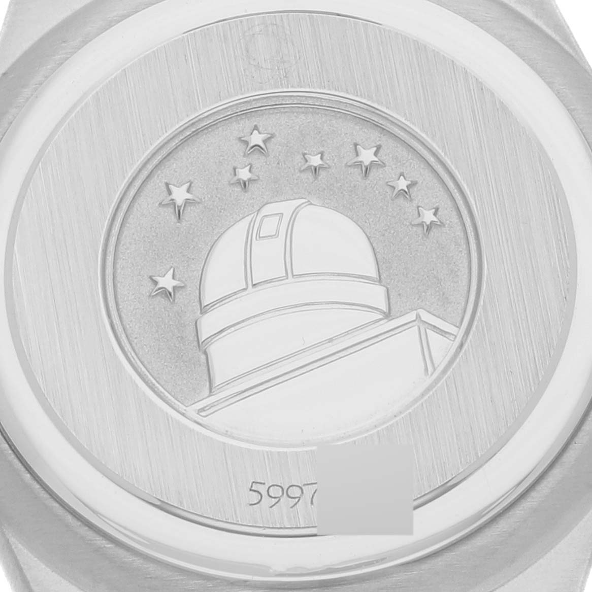 This image shows the back casing of the Omega 1465.79.00 Women's Stainless Steel Mother of Pearl Dial 1465.79.00 Women's Stainless Steel Mother of Pearl Dial Constellation Iris Mother of Pearl Diamond Steel Ladies Watch 1465.79.00.