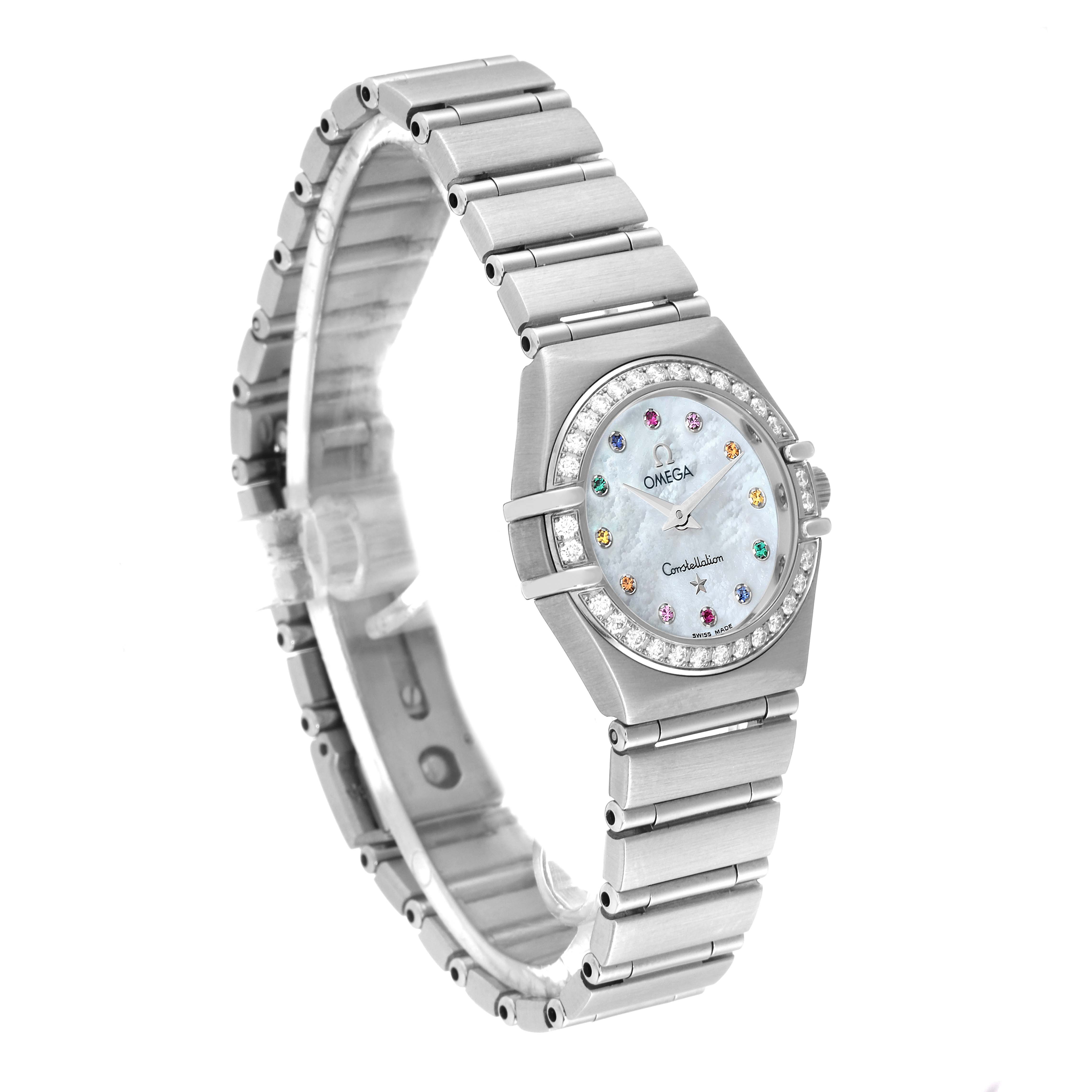The image shows a side angle of the Omega 1460.79.00 Women's Stainless Steel Mother of Pearl Dial 1460.79.00 Women's Stainless Steel Mother of Pearl Dial Constellation Iris Steel Multi Stone Ladies Watch 1460.79.00 displaying its face and band.