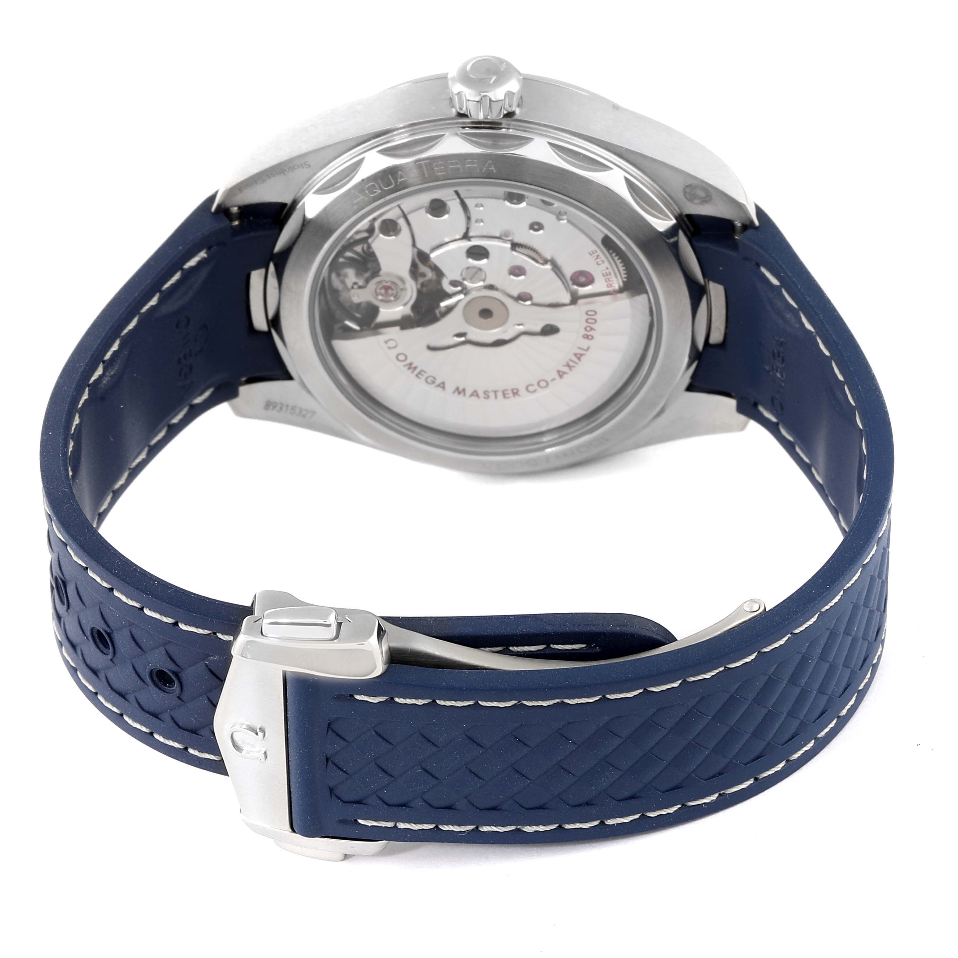The image shows the back view of the Omega Aqua Terra 220.12.41.21.06.001 Men
s Stainless Steel Grey Dial 220.12.41.21.06.001 Men
s Stainless Steel Grey Dial watch, highlighting its movement and blue strap with clasp.