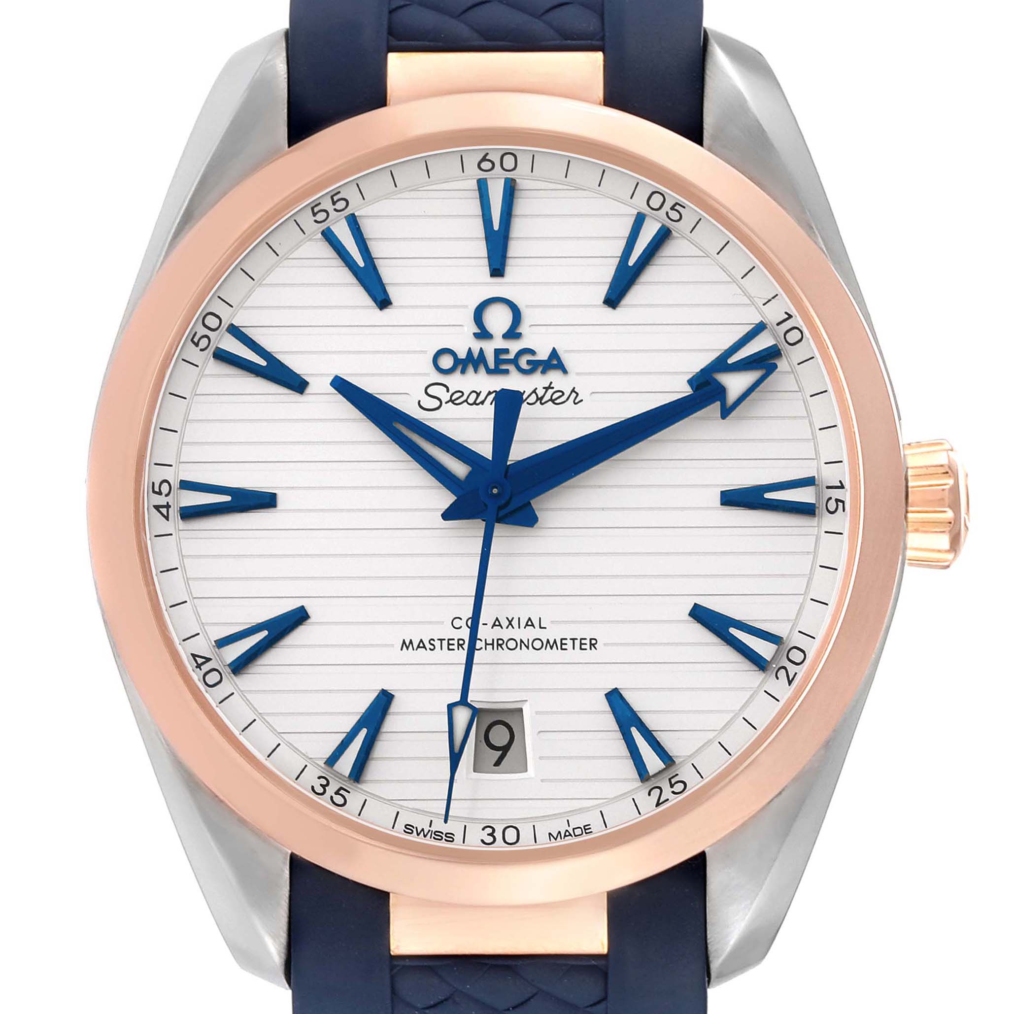 This is a front view of the Omega Aqua Terra 220.22.38.20.02.001 Men's Steel and Gold (two tone) Silver Dial 220.22.38.20.02.001 Men's Steel and Gold (two tone) Silver Dial model, showing the dial, hands, bezel, and part of the blue strap.