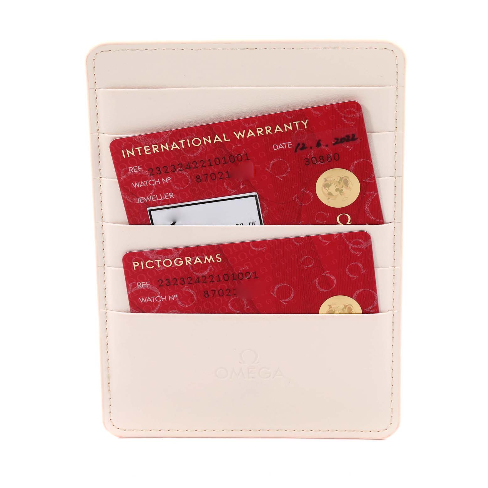 The image shows warranty and pictograms cards for the Omega Planet Ocean 232.32.42.21.01.001 Men
s Stainless Steel Black Dial 232.32.42.21.01.001 Men
s Stainless Steel Black Dial model, placed in a cream-colored cardholder.