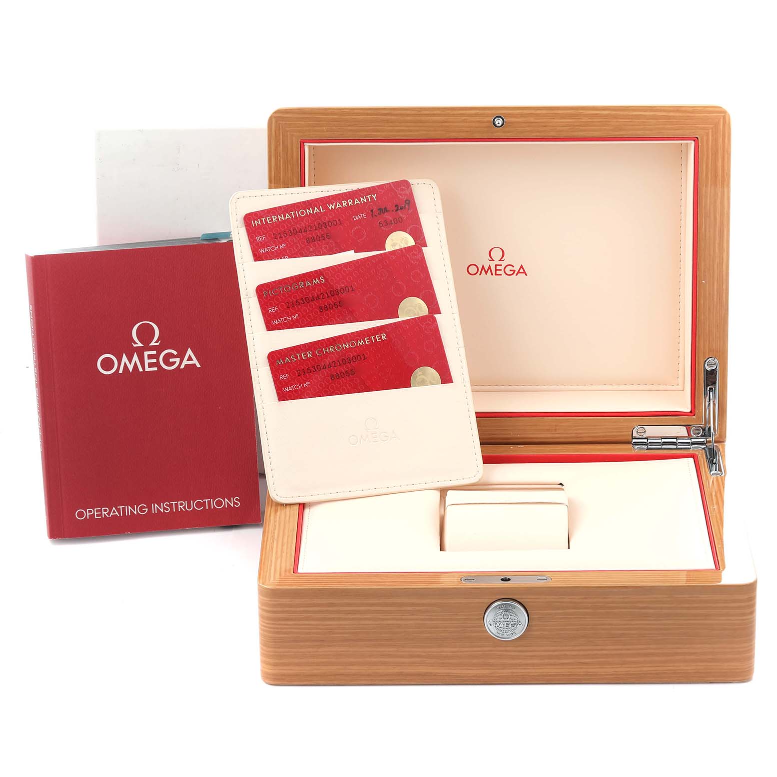 The image shows an Omega Planet Ocean 215.30.44.21.03.001 Men's Stainless Steel Blue Dial 215.30.44.21.03.001 Men's Stainless Steel Blue Dial watch box, instruction manual, and warranty cards from a front angle.