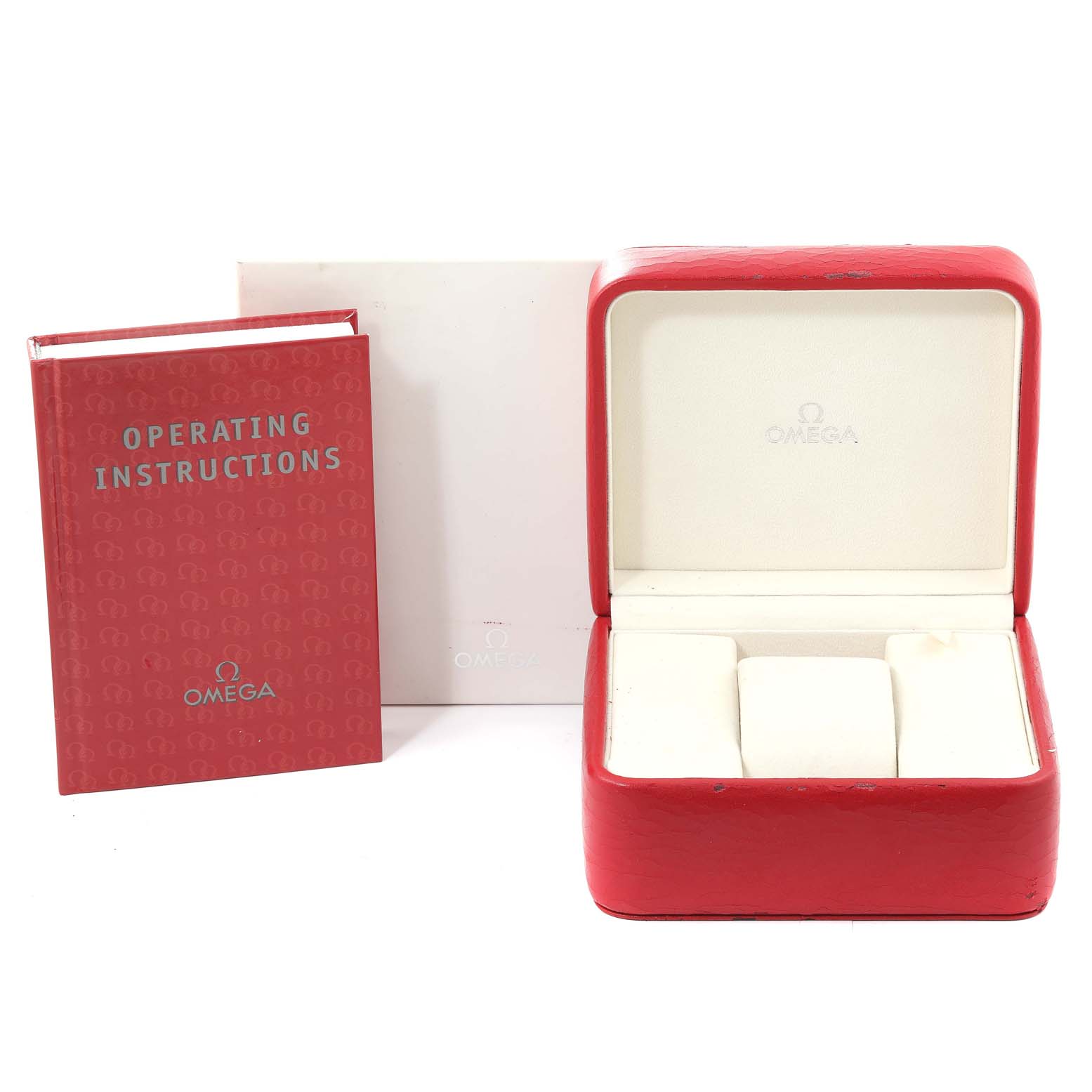 The image shows a red Omega Speedmaster 323.10.40.40.02.001 Men's Stainless Steel Silver Dial 323.10.40.40.02.001 Men's Stainless Steel Silver Dial watch box, operating instructions booklet, and outer box from a front view.