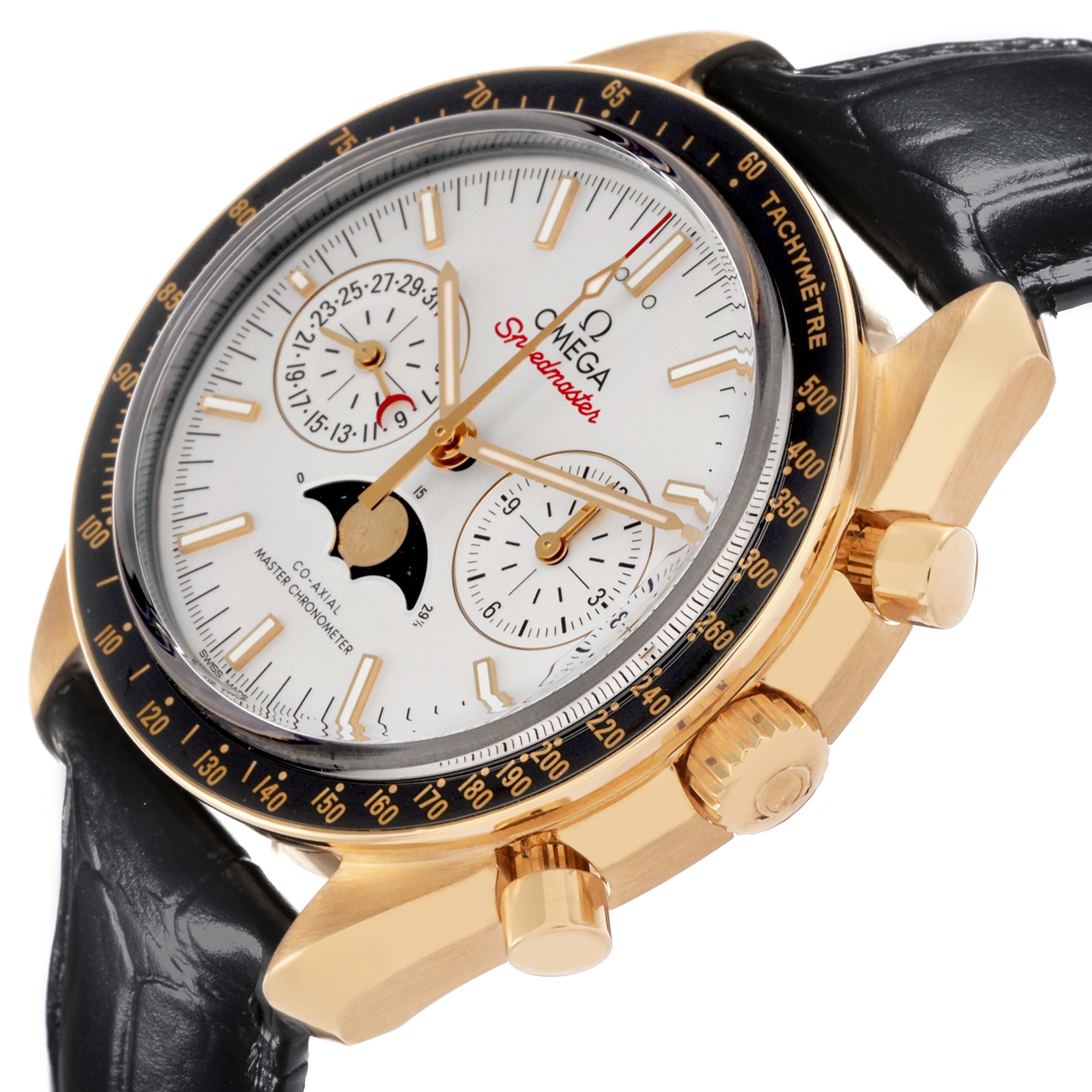 The Omega Speedmaster 304.63.44.52.02.001 Men's Yellow Gold Silver Dial 304.63.44.52.02.001 Men's Yellow Gold Silver Dial watch is shown from a three-quarter angle, highlighting the dial, bezel, crown, and pushers.