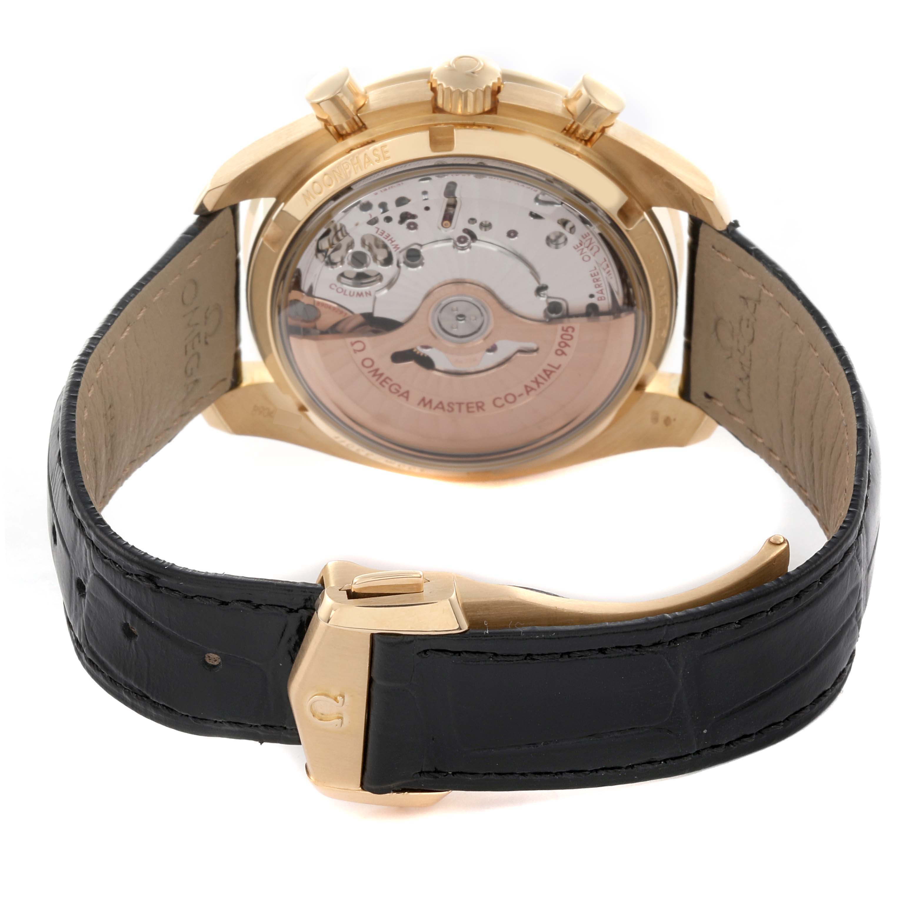 This image shows the back view of an Omega Speedmaster 304.63.44.52.02.001 Men's Yellow Gold Silver Dial 304.63.44.52.02.001 Men's Yellow Gold Silver Dial, highlighting its movement and leather strap.