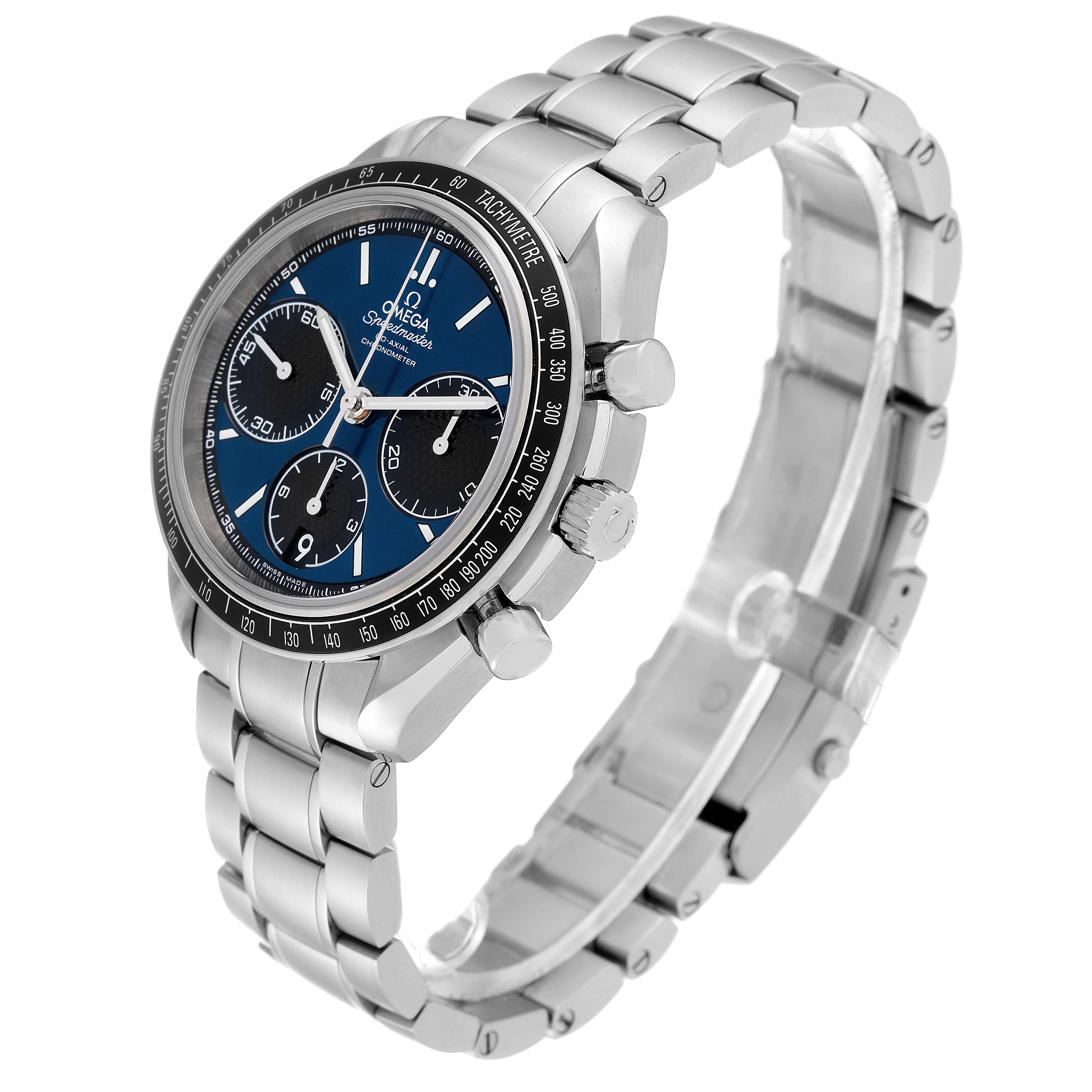 The image shows an angled view of an Omega Speedmaster 326.30.40.50.03.001 Men
s Stainless Steel Blue Dial 326.30.40.50.03.001 Men
s Stainless Steel Blue Dial watch, focusing on the face, bezel, and stainless steel bracelet.