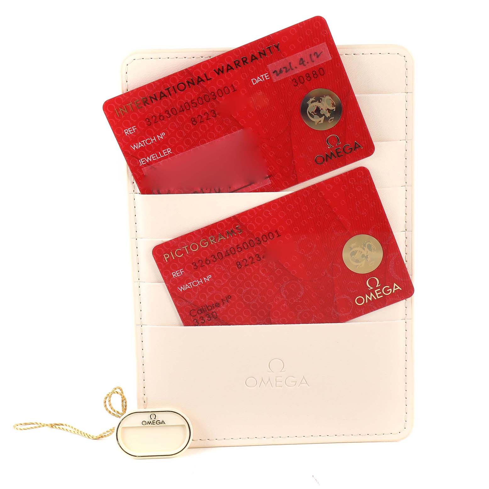 The image shows Omega Speedmaster 326.30.40.50.03.001 Men
s Stainless Steel Blue Dial 326.30.40.50.03.001 Men
s Stainless Steel Blue Dial warranty and pictogram cards in a white cardholder, along with an Omega tag.