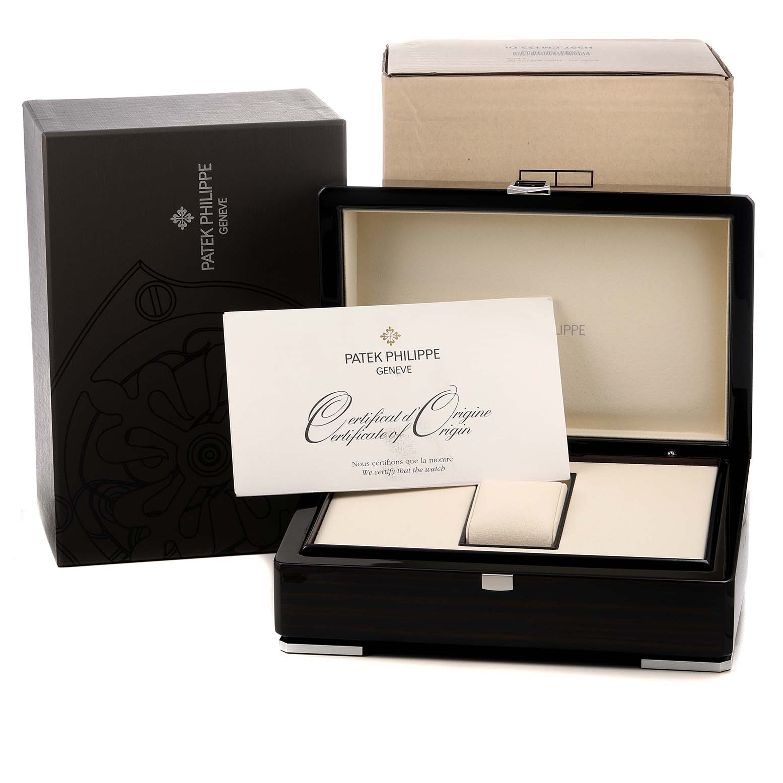 The image shows packaging and a certificate for the Patek Philippe Aquanaut 5167A Men's Stainless Steel Black Dial, including a box and a certificate of origin.