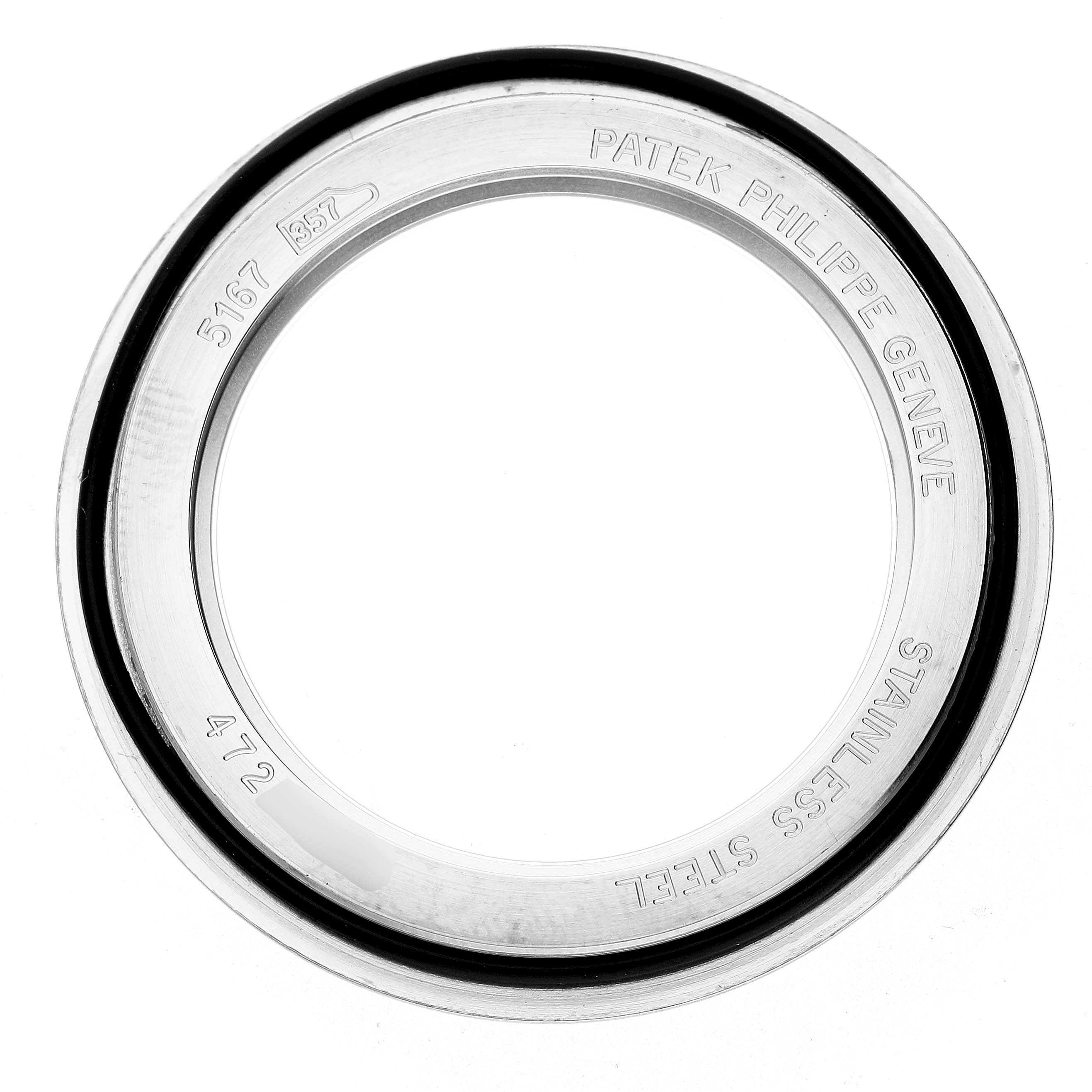 The image shows a top view of a stainless steel bezel for a Patek Philippe Aquanaut 5167A Men's Stainless Steel Black Dial watch.
