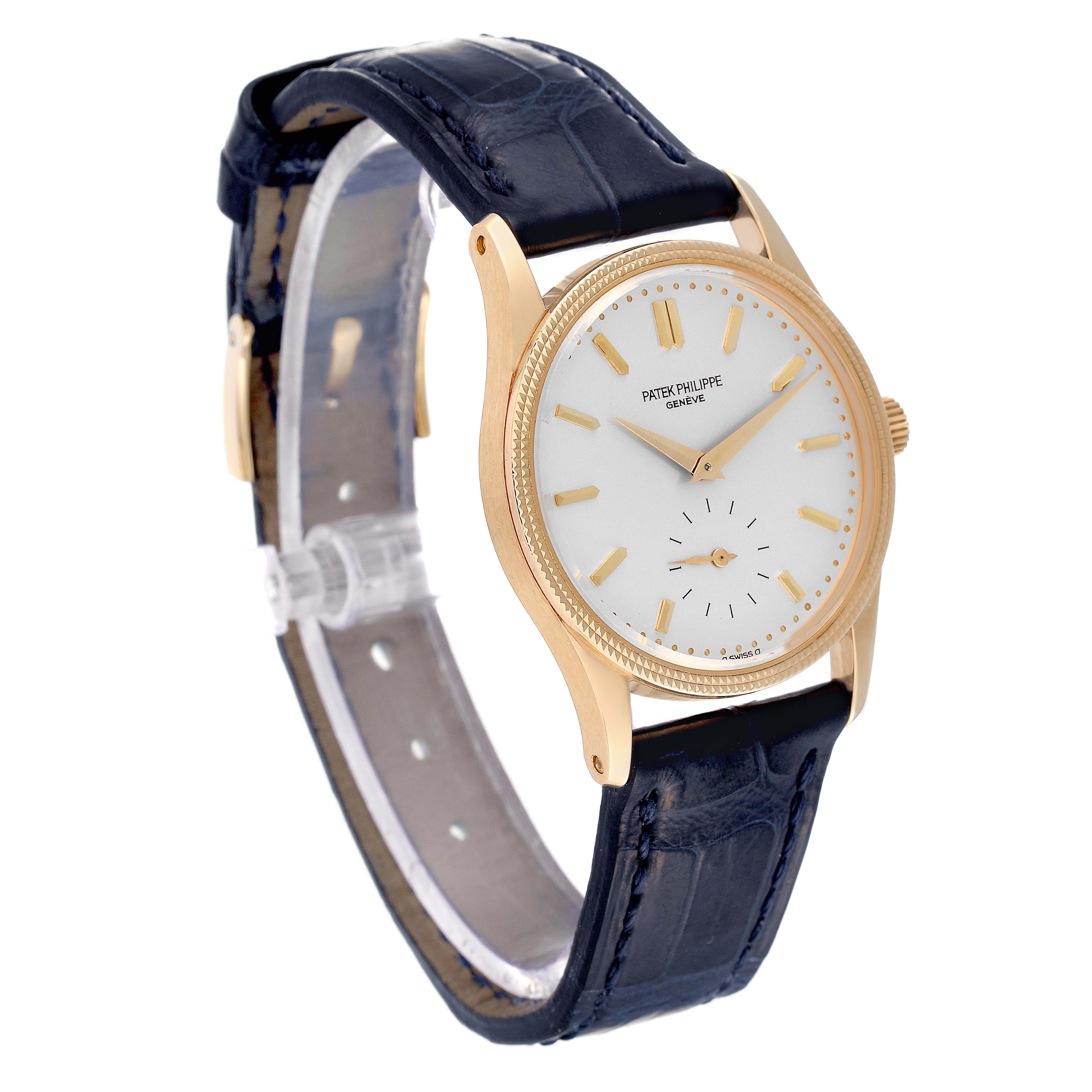 The Patek Philippe Calatrava 3796 Men's Yellow Gold Silver Dial 3796 Men's Yellow Gold Silver Dial watch is shown at a three-quarter angle, highlighting the dial, case, and leather strap.