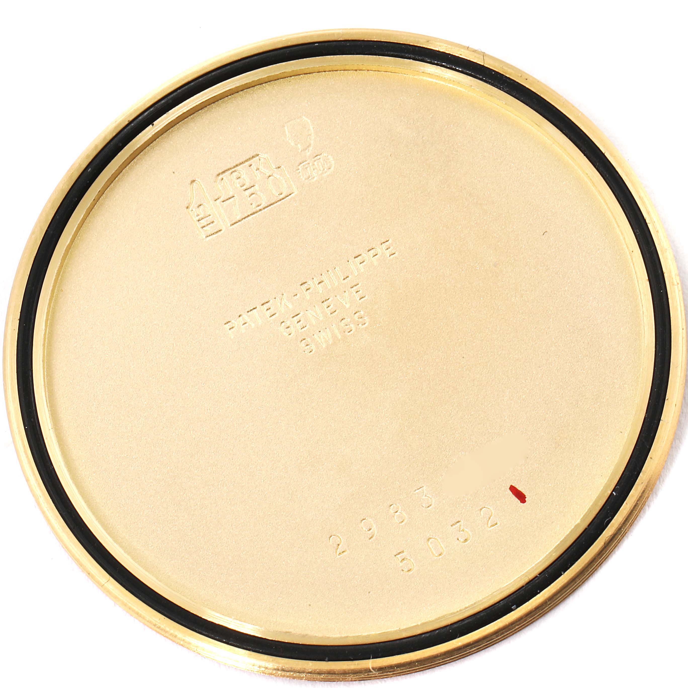 This image shows the back cover of a Patek Philippe Calatrava 5032J Men's Yellow Gold Silver Dial 5032J Men's Yellow Gold Silver Dial watch.