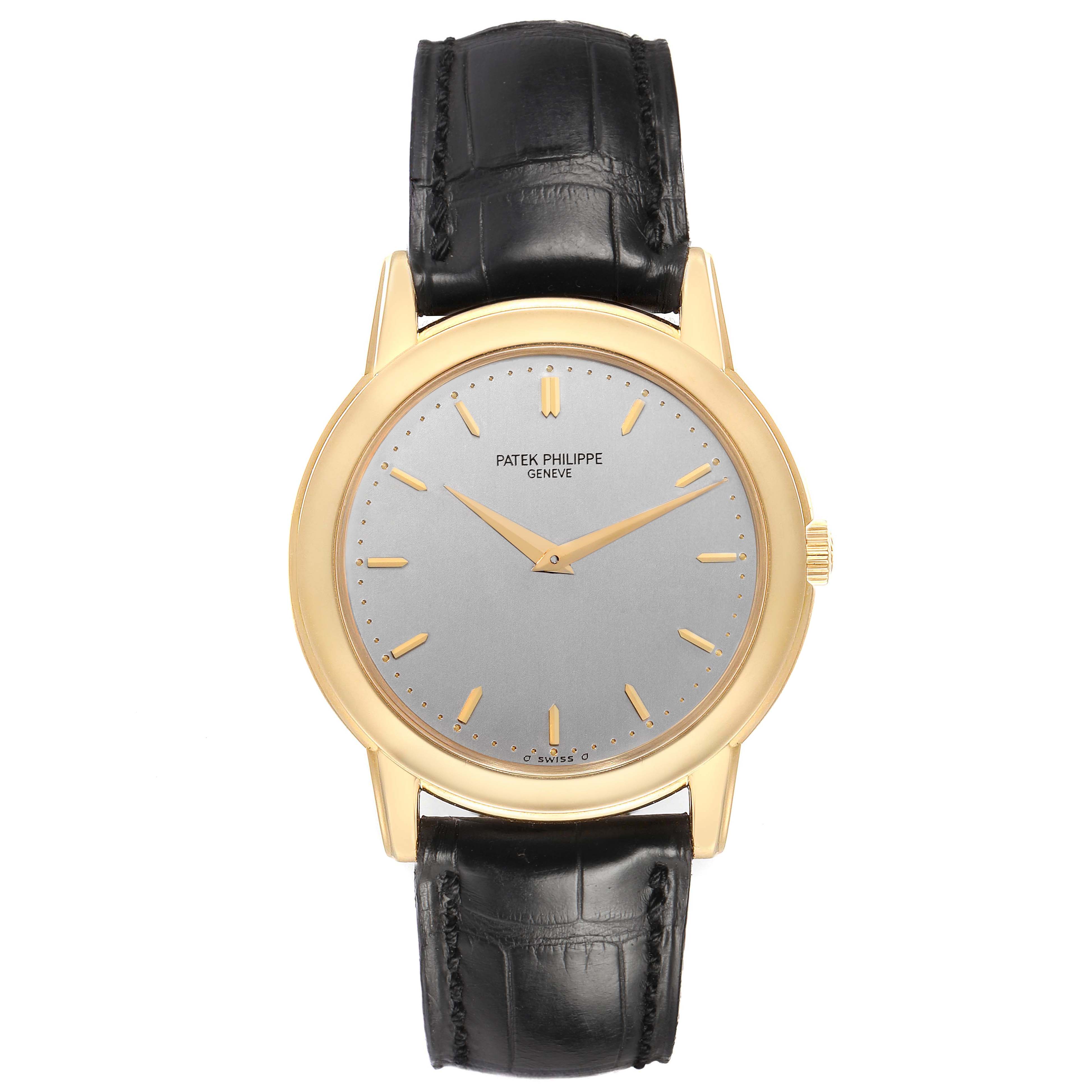 The Patek Philippe Calatrava 5032J Men's Yellow Gold Silver Dial watch is shown from the front, displaying its dial, case, crown, and strap.