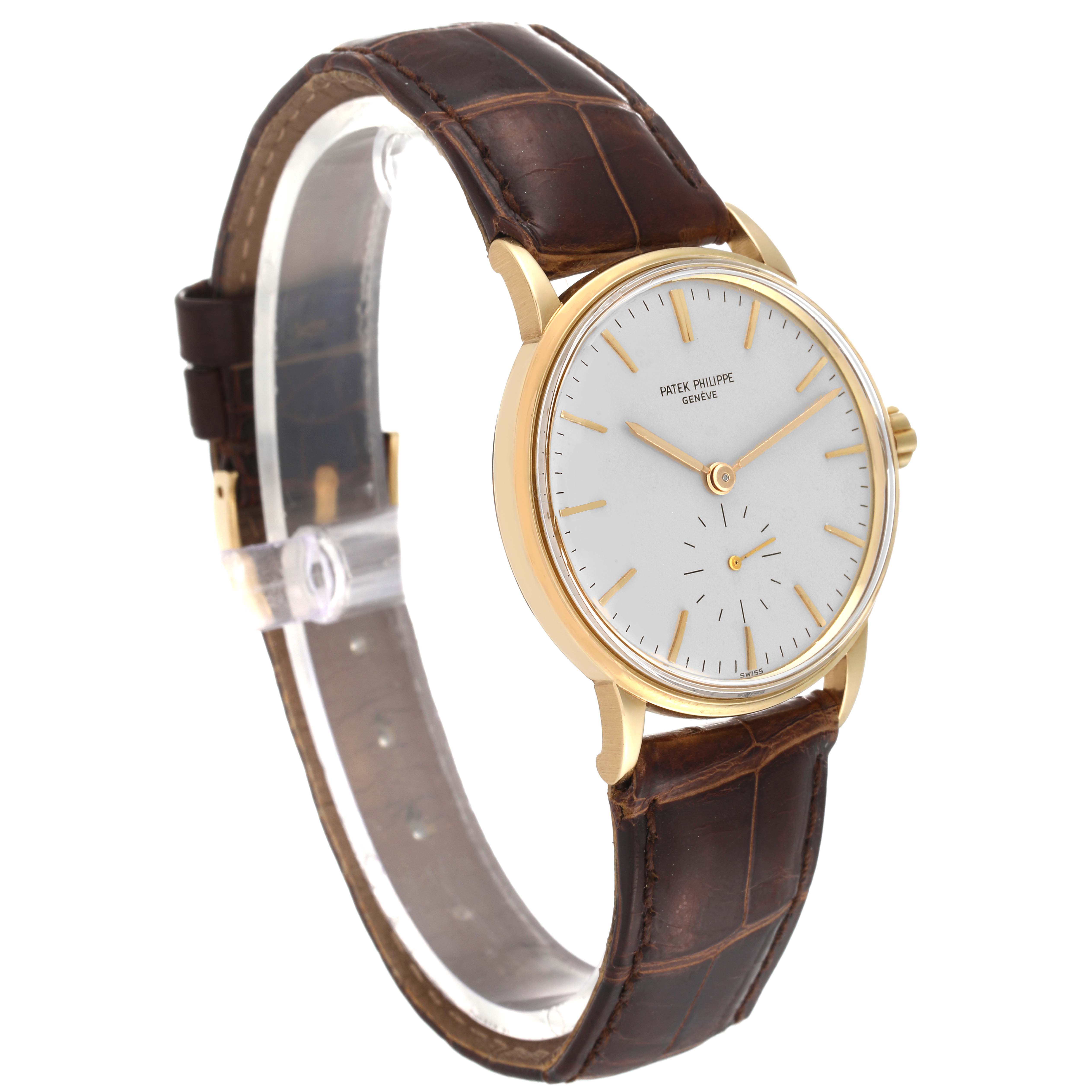 The image shows a side angle of a Patek Philippe Calatrava 3425 Men's Yellow Gold Silver Dial 3425 Men's Yellow Gold Silver Dial watch, highlighting the face, strap, and case.