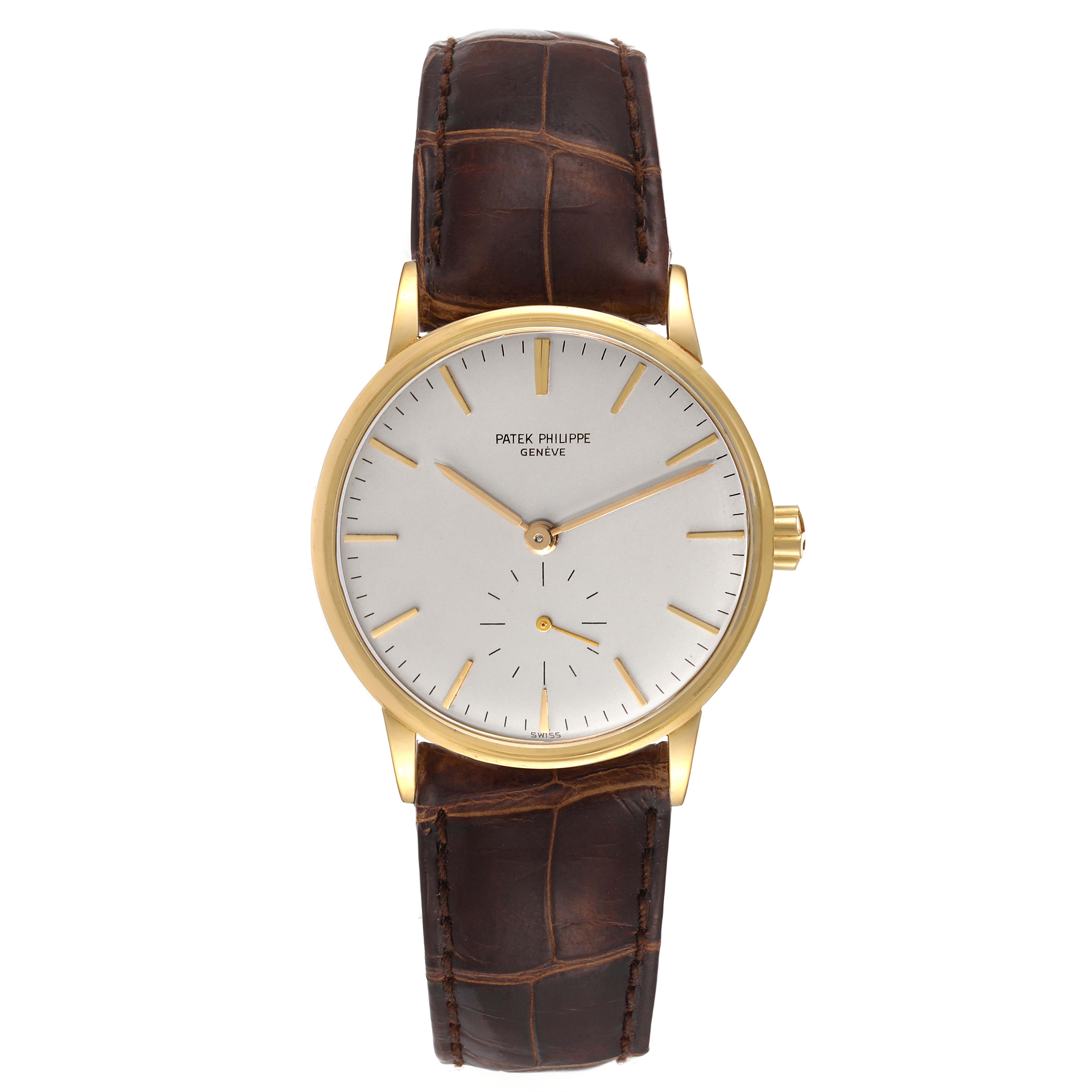 The image shows a front view of the Patek Philippe Calatrava 3425 Men's Yellow Gold Silver Dial 3425 Men's Yellow Gold Silver Dial watch, displaying the dial, hands, bezel, and brown leather strap.