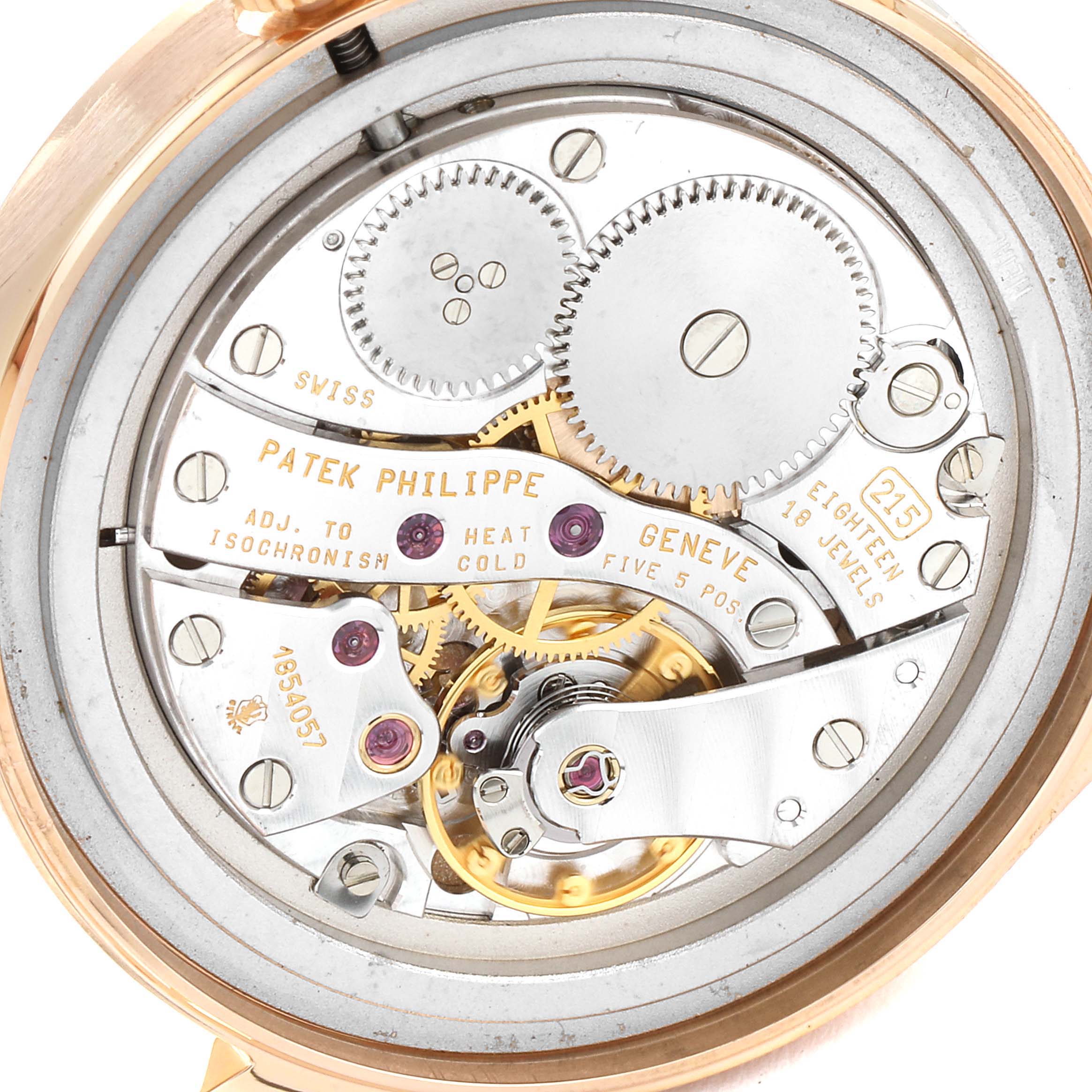 The image shows a close-up of the movement mechanism of a Patek Philippe Calatrava 3796R Men's Rose Gold Silver Dial 3796R Men's Rose Gold Silver Dial watch.