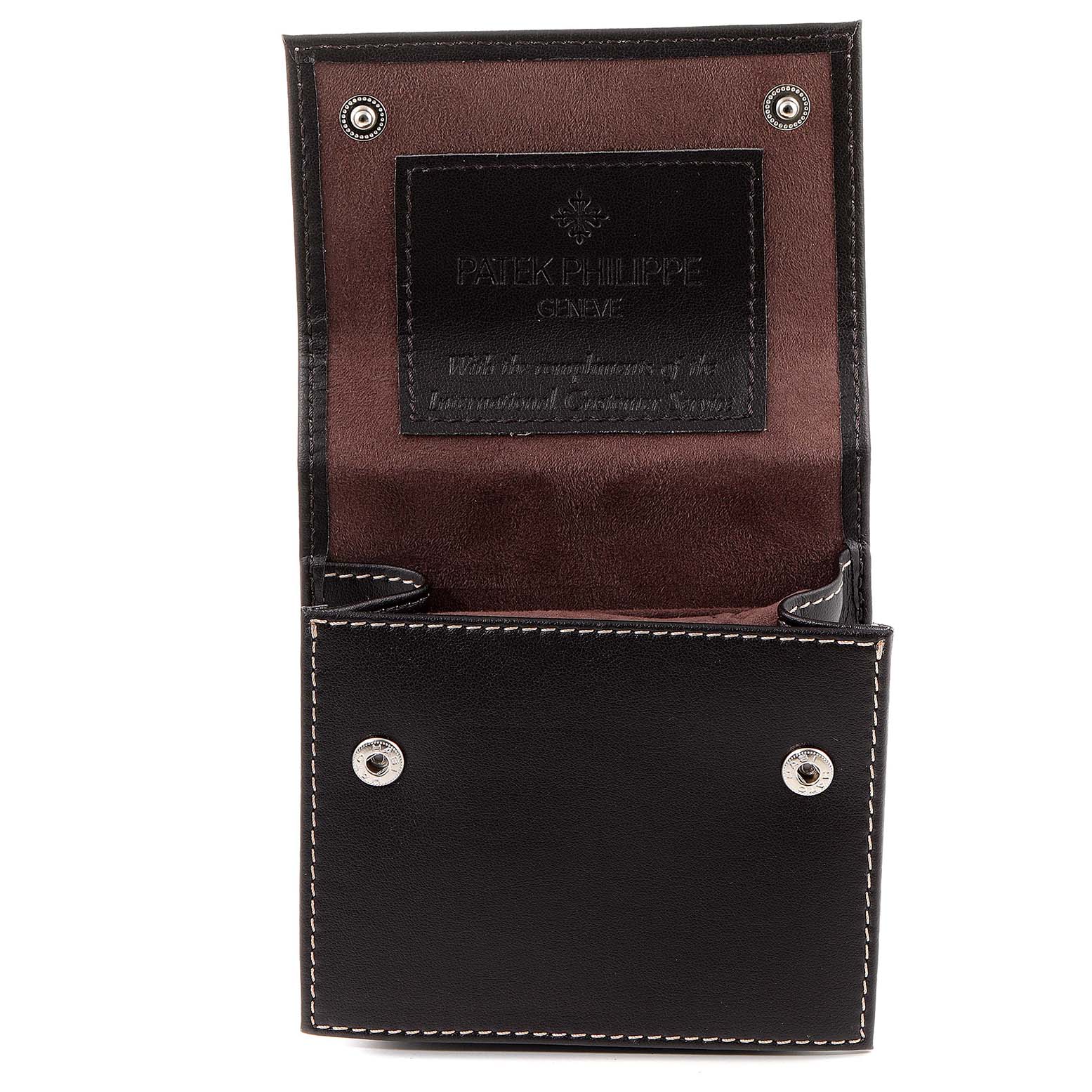 This image shows the open case for the Patek Philippe Gondolo 4825G/101 Women's White Gold White Dial 4825G/101 Women's White Gold White Dial watch, displaying the brand's name inside.