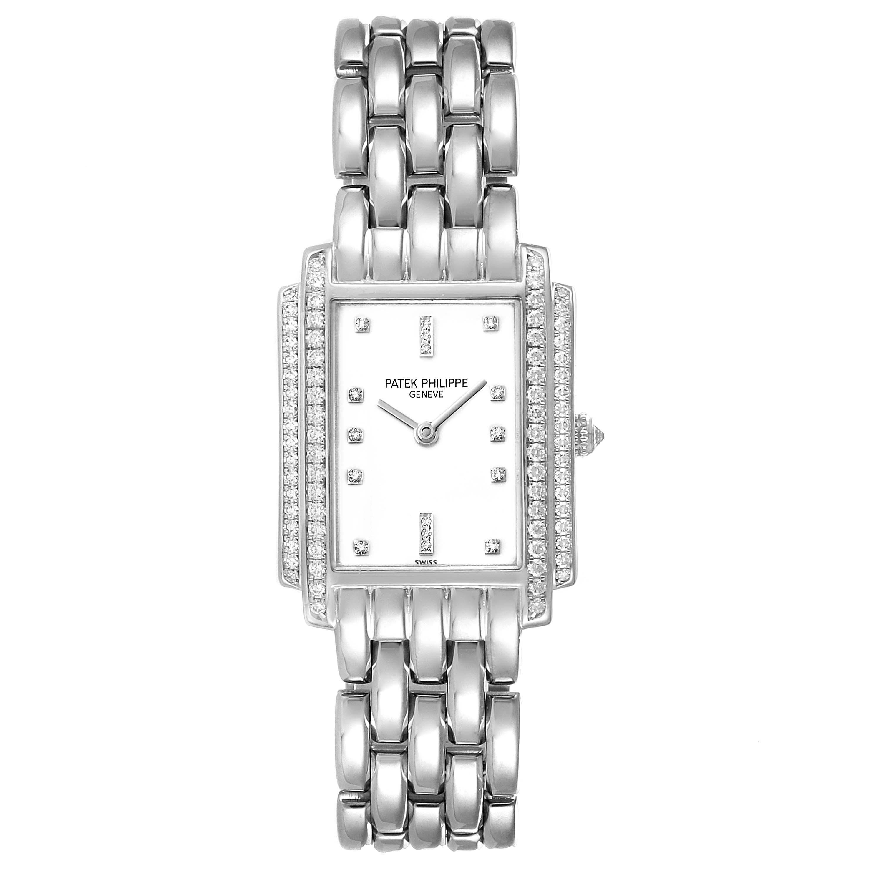 The image shows a frontal view of a Patek Philippe Gondolo 4825G/101 Women's White Gold White Dial 4825G/101 Women's White Gold White Dial watch, showcasing its rectangular dial and metallic bracelet.
