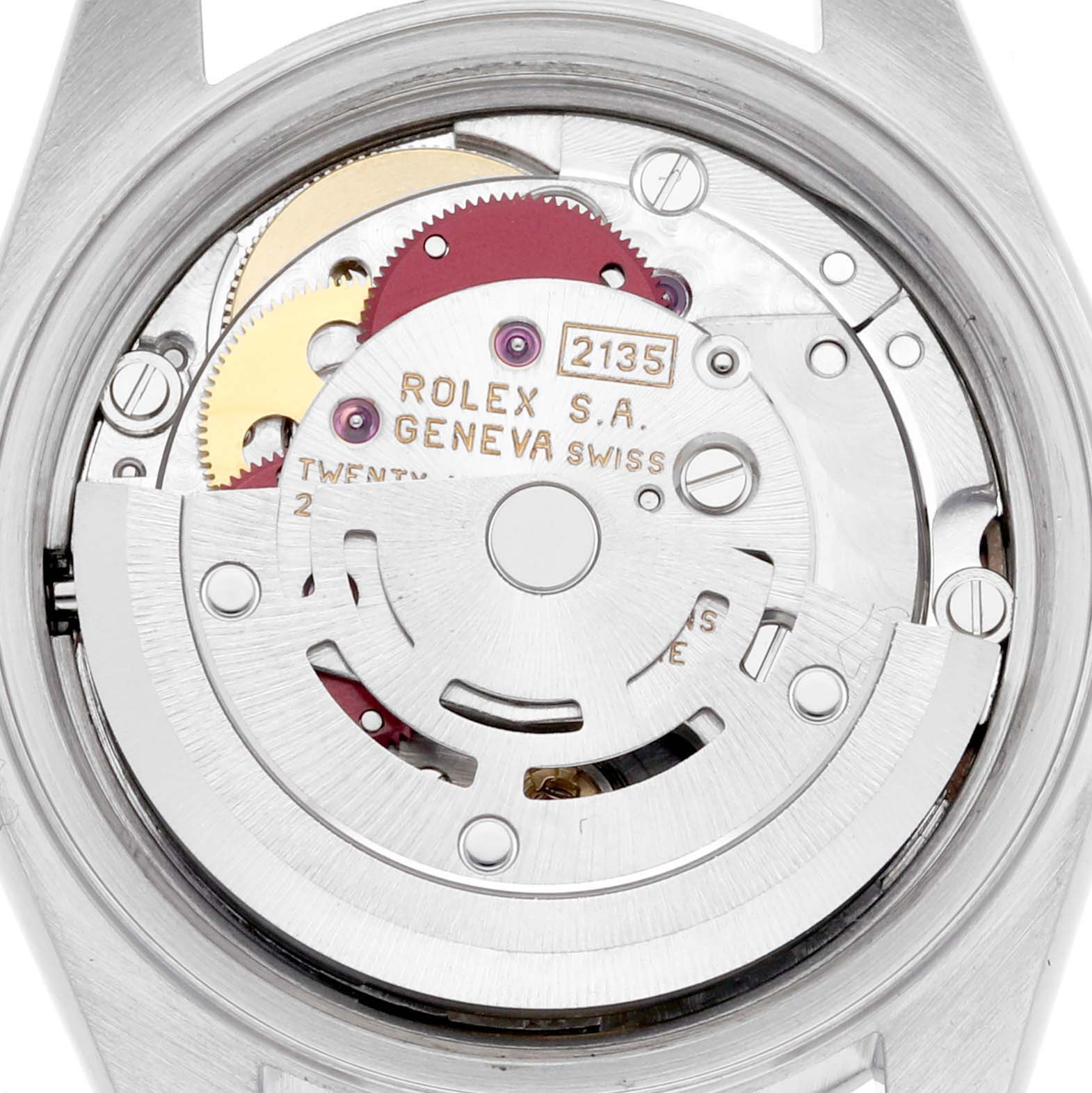 The image shows the movement of the Rolex Date 69160 Women's Stainless Steel Silver Dial 69160 Women's Stainless Steel Silver Dial model from the back, highlighting gears and inscriptions.