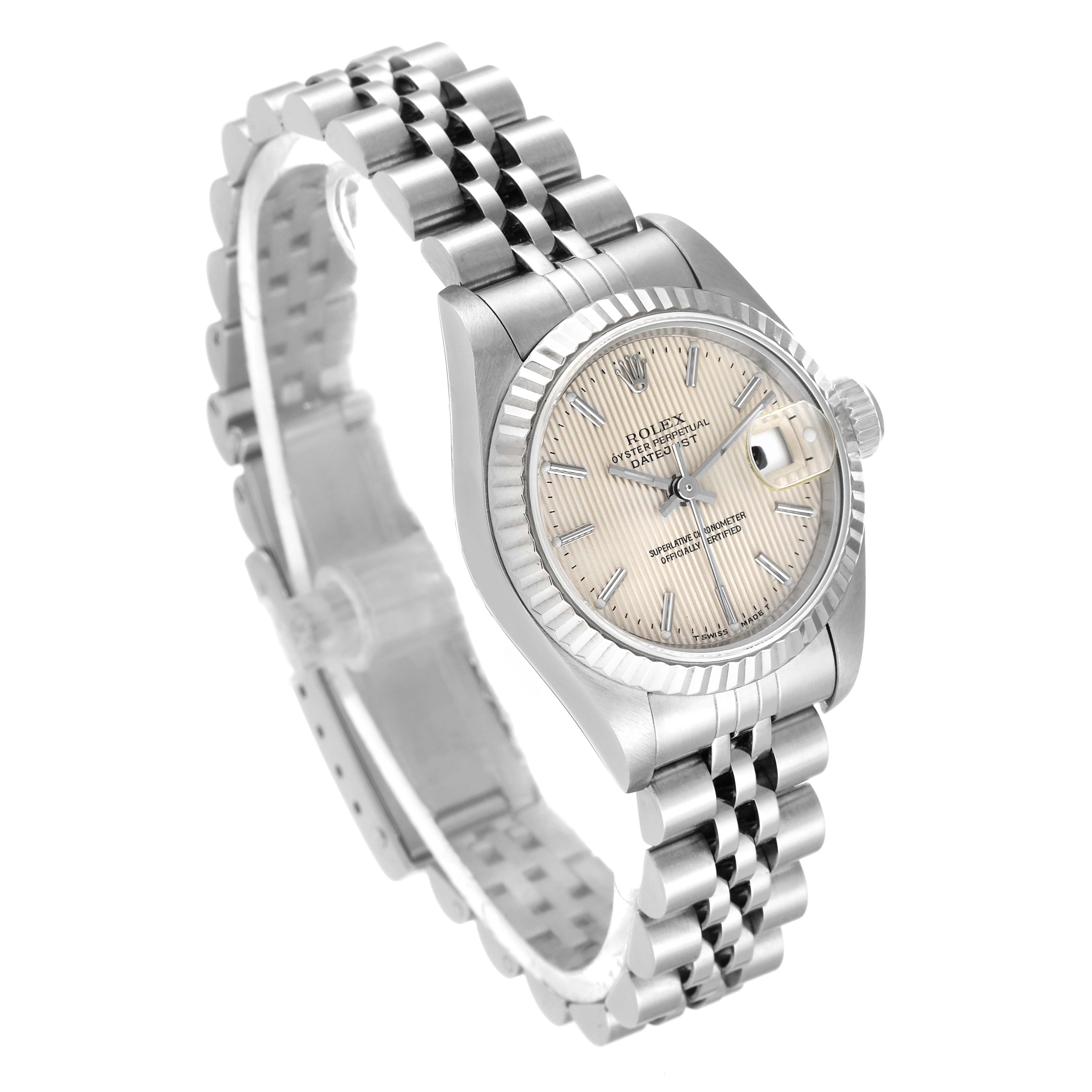 The image shows the Rolex Datejust 69174 Women
s Stainless Steel Silver Dial 69174 Women
s Stainless Steel Silver Dial model watch at a three-quarter angle, highlighting its bracelet, dial, bezel, and crown.