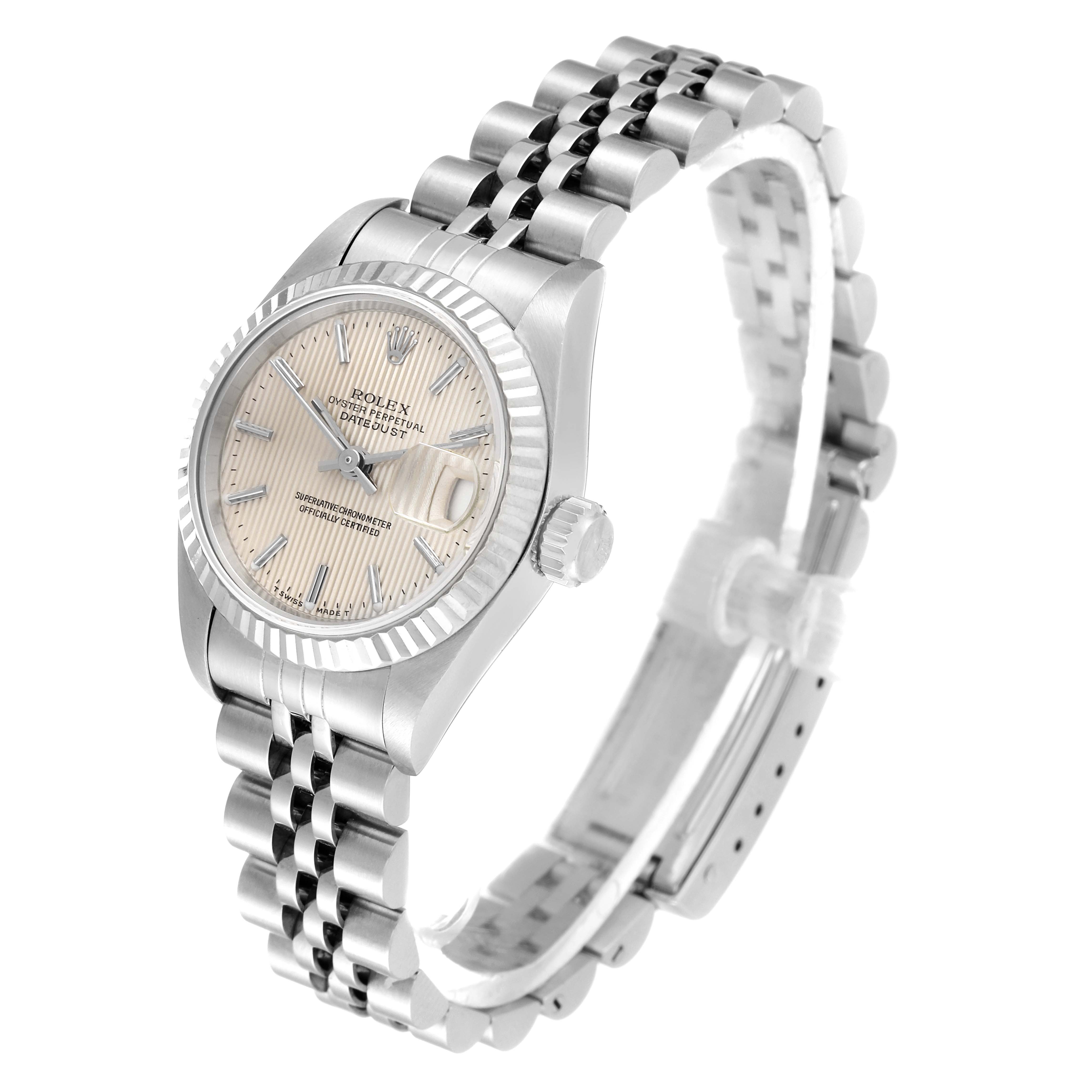 The Rolex Datejust 69174 Women
s Stainless Steel Silver Dial 69174 Women
s Stainless Steel Silver Dial watch is shown at a slight angled side view, highlighting its face, bezel, crown, and jubilee bracelet.