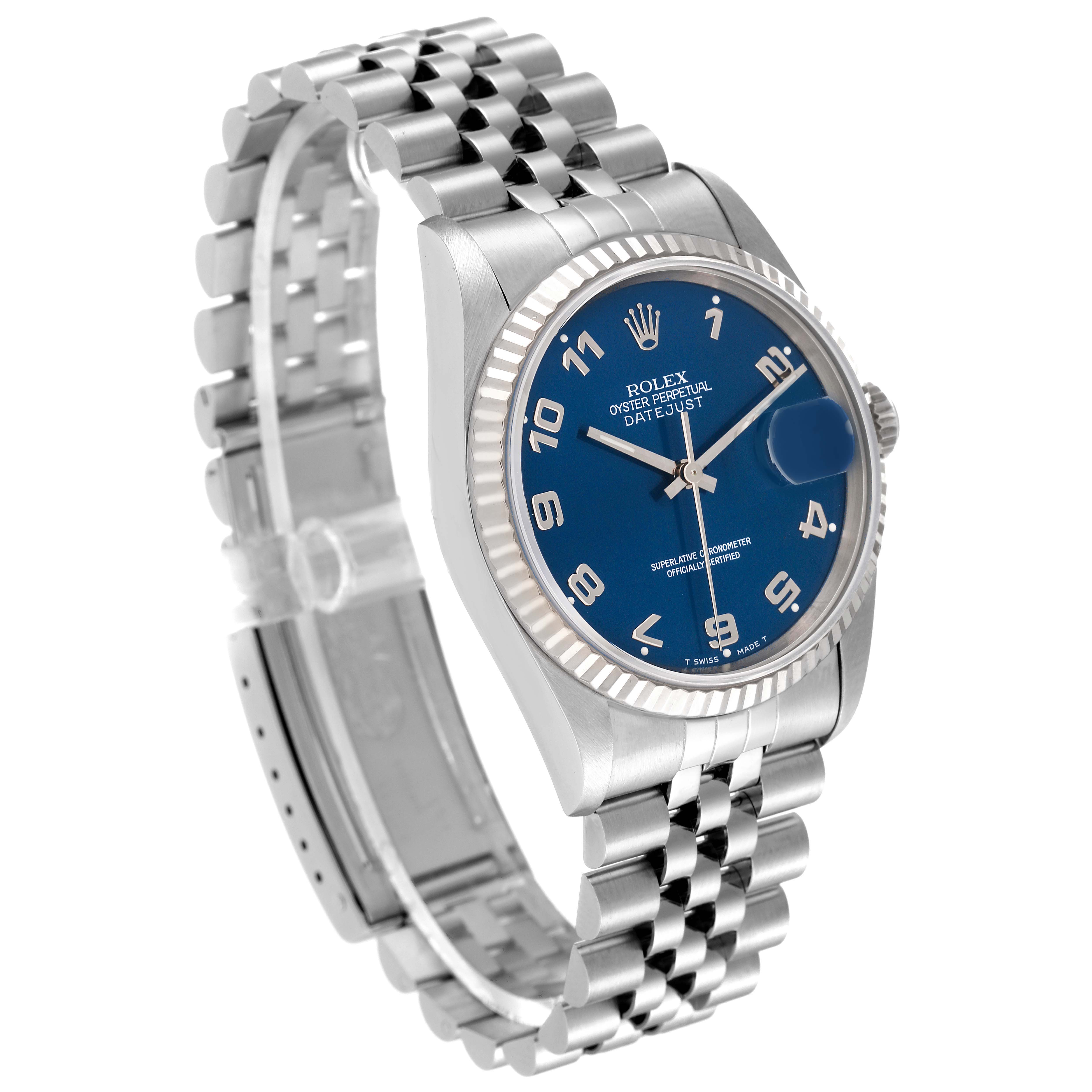 This image shows a Rolex Datejust 16234 Men's Stainless Steel Blue Dial 16234 Men's Stainless Steel Blue Dial watch from an oblique angle, highlighting the blue dial, fluted bezel, and Jubilee bracelet.