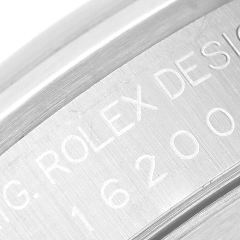 This image shows the engraved side of the case of a Rolex Datejust 16200 Men's Stainless Steel White Dial 16200 Men's Stainless Steel White Dial watch.