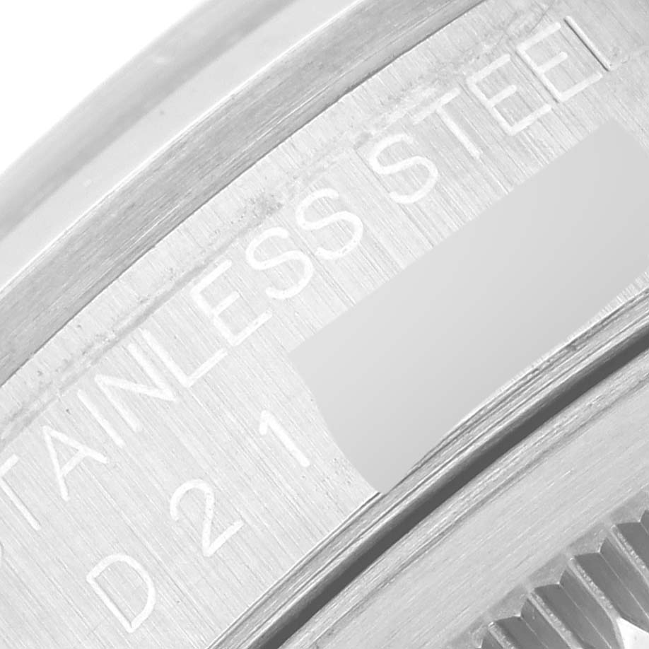 The image shows a close-up angle of the stainless steel case and serrated edge of the bezel of a Rolex Datejust 16200 Men's Stainless Steel White Dial 16200 Men's Stainless Steel White Dial watch.