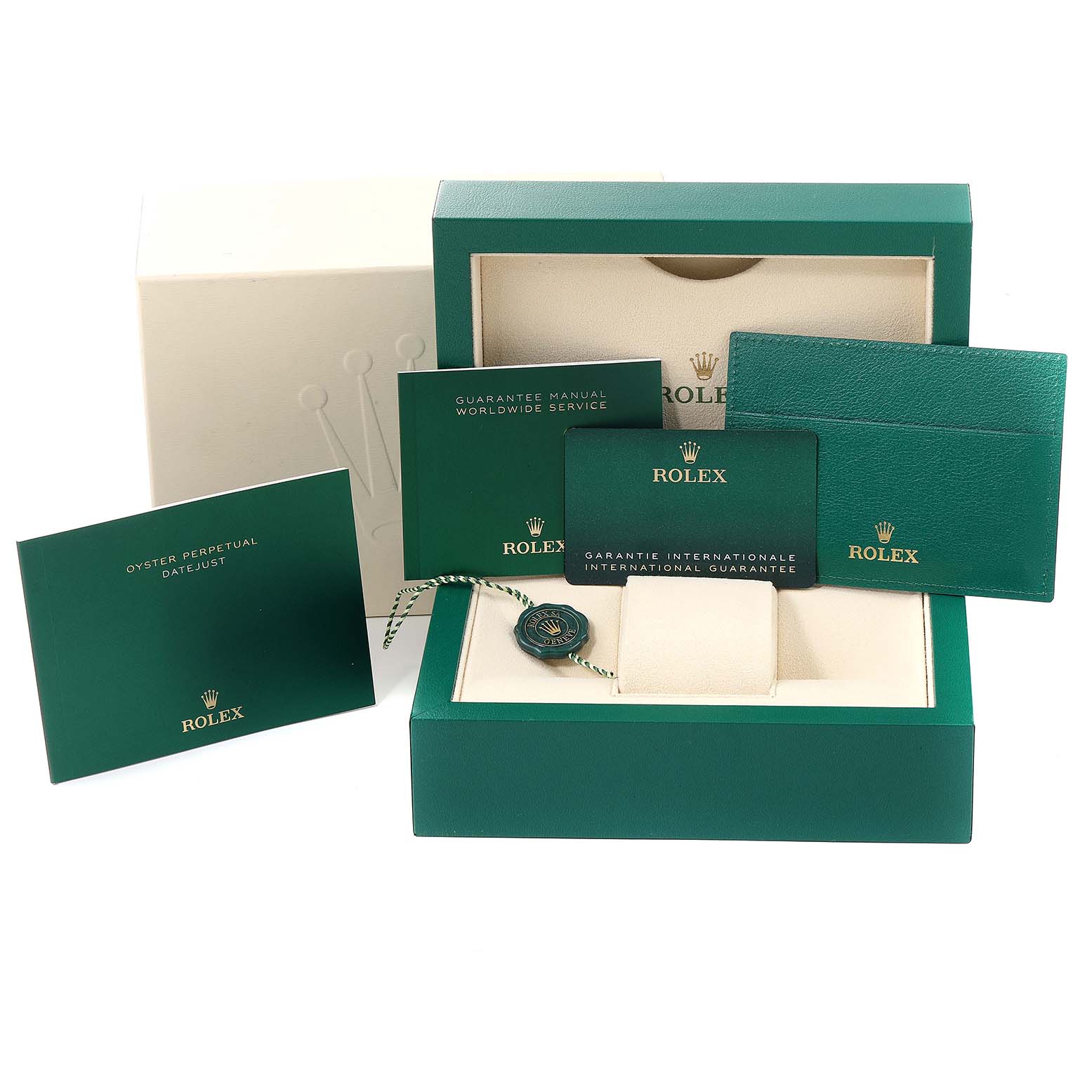 This image shows the packaging and accessories for a Rolex Datejust 41 126331 Men's Steel and Gold (two tone) Grey Dial 126331 Men's Steel and Gold (two tone) Grey Dial, including manuals, warranty card, and box.