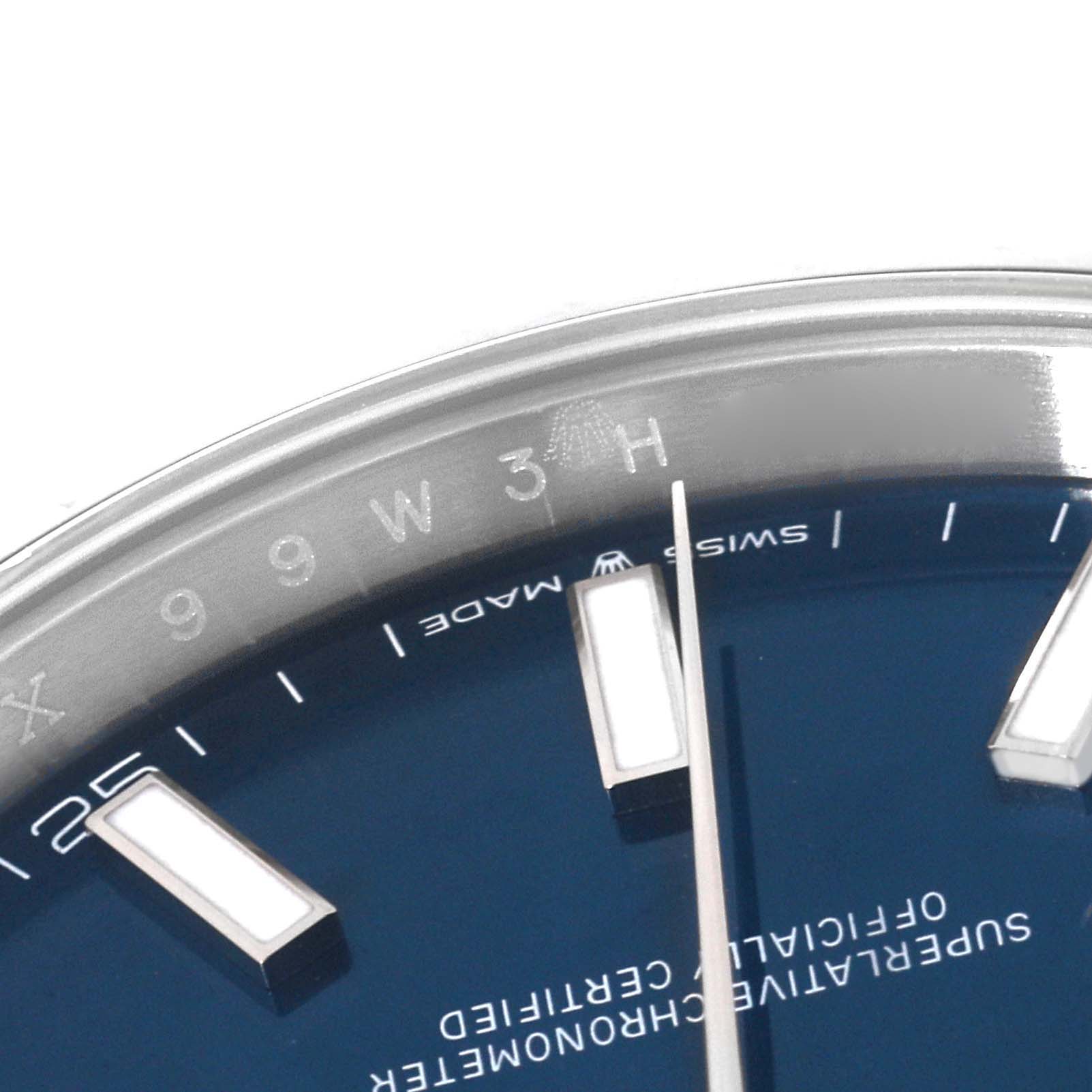 This is a close-up angle of the dial and part of the bezel of the Rolex Datejust 41 126334 Men
s Stainless Steel Blue Dial 126334 Men
s Stainless Steel Blue Dial model, showing the markers and text.