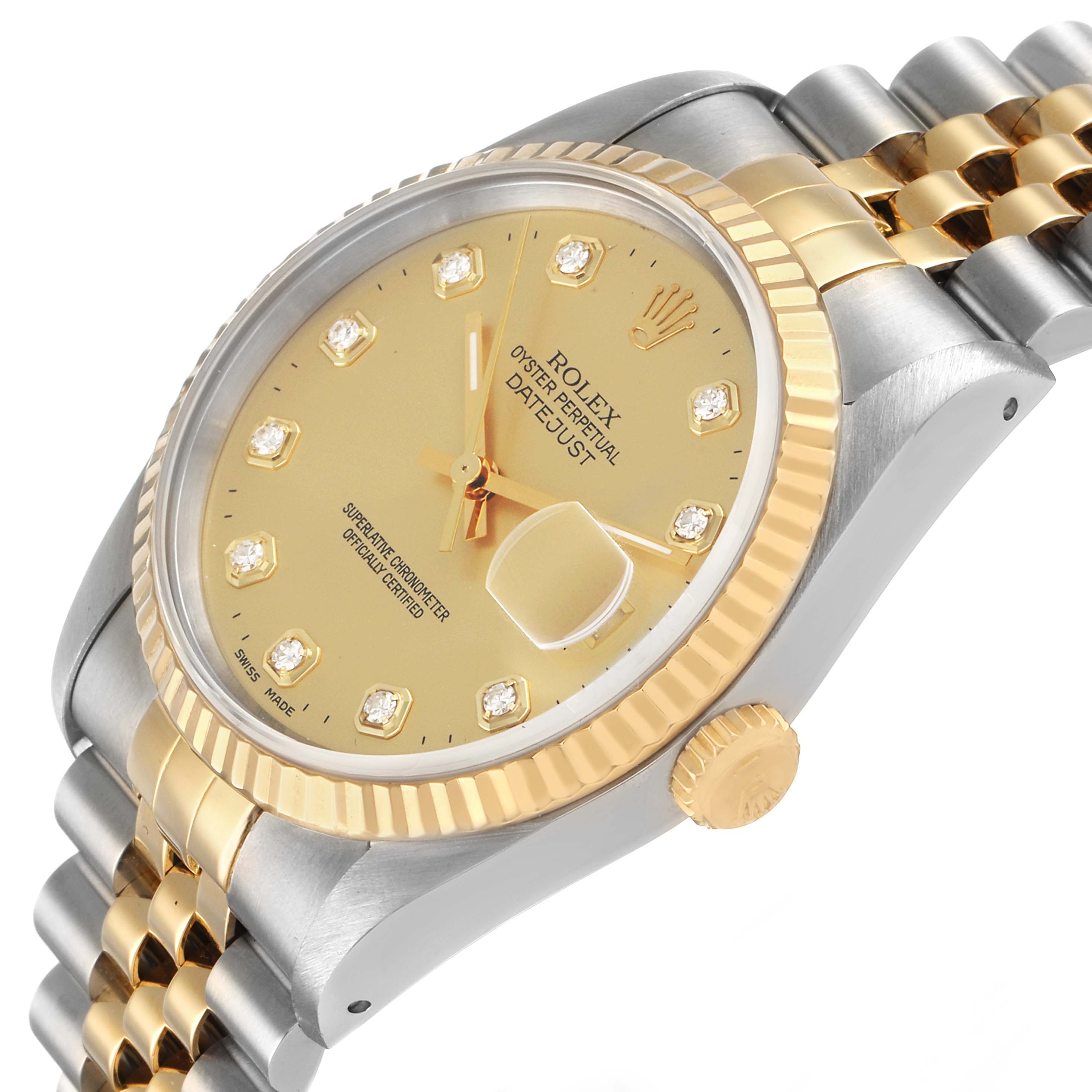 The Rolex Datejust 16233 Men's Steel and Gold (two tone) Champagne Dial watch is shown at an angled view highlighting the dial, bezel, crown, and part of the bracelet.