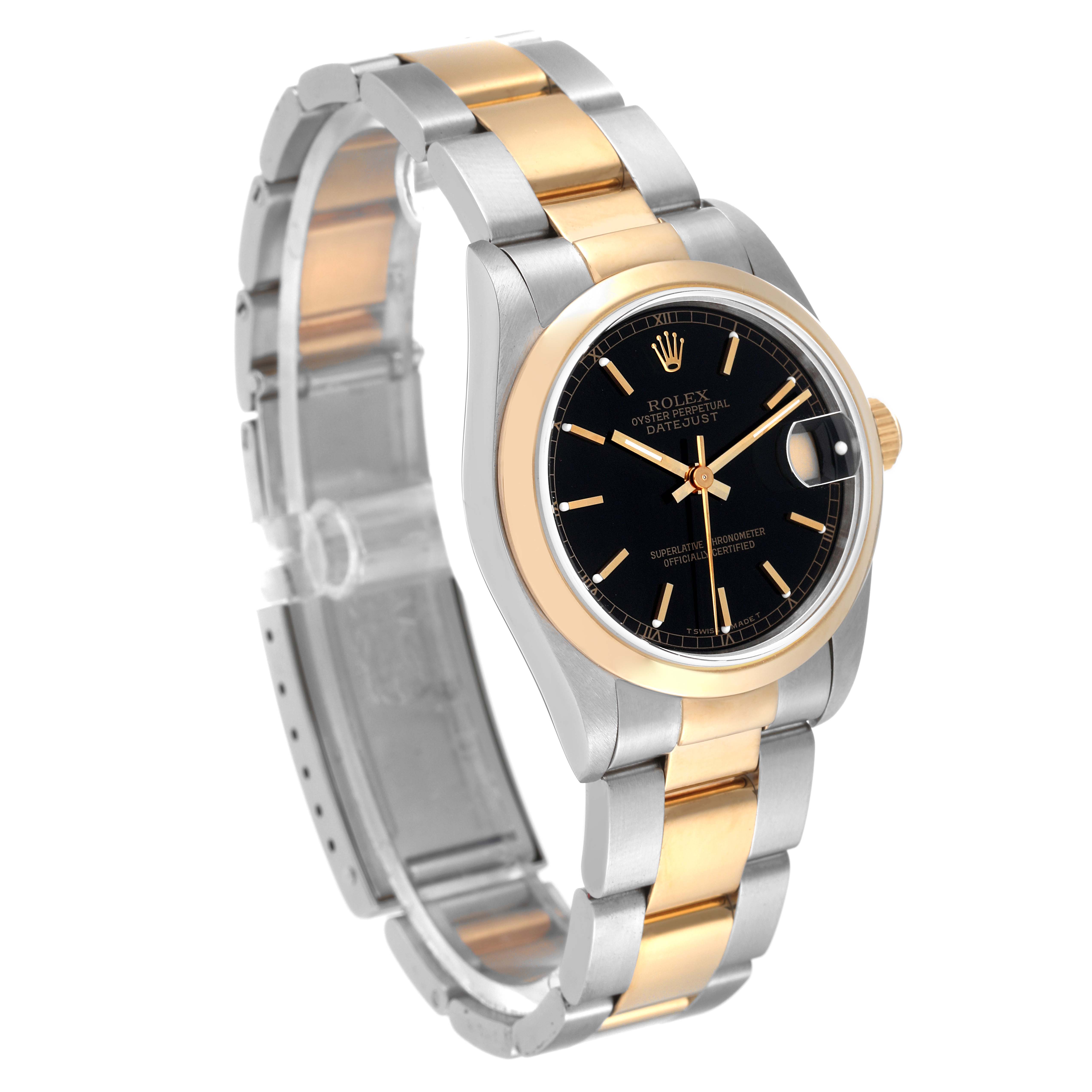 This image shows a Rolex Mid-Size 68243 Women
s Steel and Gold (two tone) Black Dial 68243 Women
s Steel and Gold (two tone) Black Dial Datejust from a three-quarter angle, highlighting its two-tone bracelet, black dial, and gold bezel.