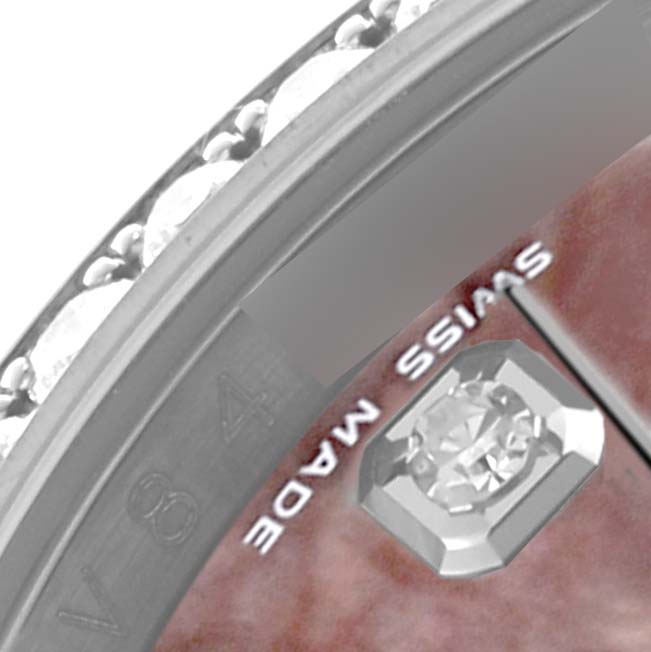 The image shows a close-up of a Rolex Datejust 116244 Men's Stainless Steel Mother of Pearl Dial 116244 Men's Stainless Steel Mother of Pearl Dial watch face, highlighting the bezel, diamond marker, and part of the dial.