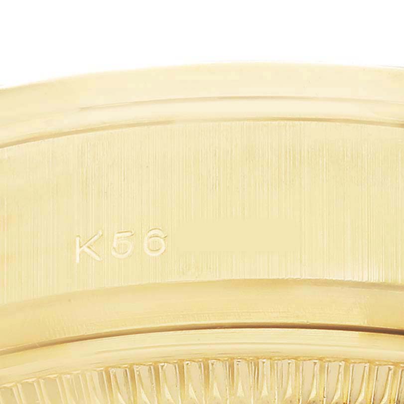 The image shows a close-up of the side engraving on a gold Rolex President 179138 Women's Yellow Gold Champagne Dial watch case.