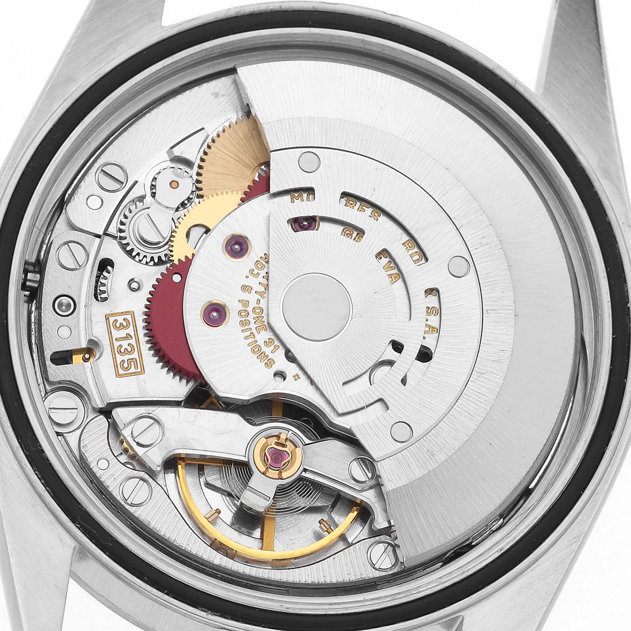 The Rolex Datejust 16234 Men's Stainless Steel Blue Dial watch is shown from the back, revealing its movement and internal components.