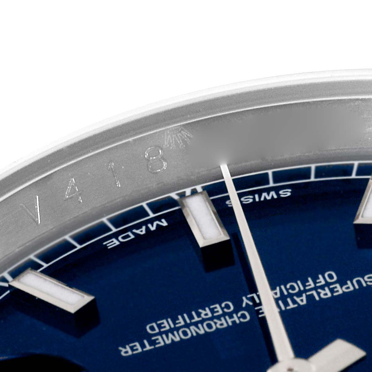 This close-up image of the Rolex Datejust 116234 Men's Stainless Steel Blue Dial 116234 Men's Stainless Steel Blue Dial watch shows a portion of the bezel, dial, and hour markers.