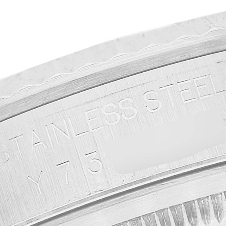 The image shows a close-up of the stainless steel casing with engravings on the Rolex Datejust 16234 Men's Stainless Steel Mother of Pearl Dial 16234 Men's Stainless Steel Mother of Pearl Dial watch, viewed from an angled side perspective.